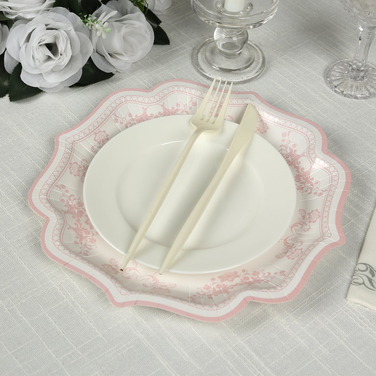 Get 25-Pack of Elegant White Disposable Paper Dessert Plates with Pink Floral Damask Print & Scallop Rim