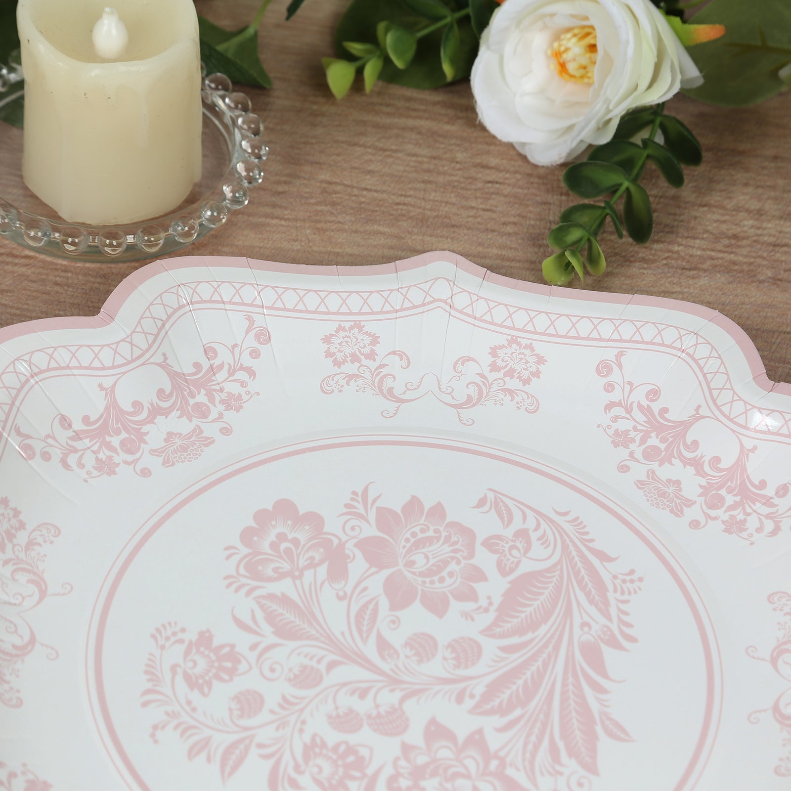 Get 25-Pack of Elegant White Disposable Paper Dessert Plates with Pink Floral Damask Print & Scallop Rim