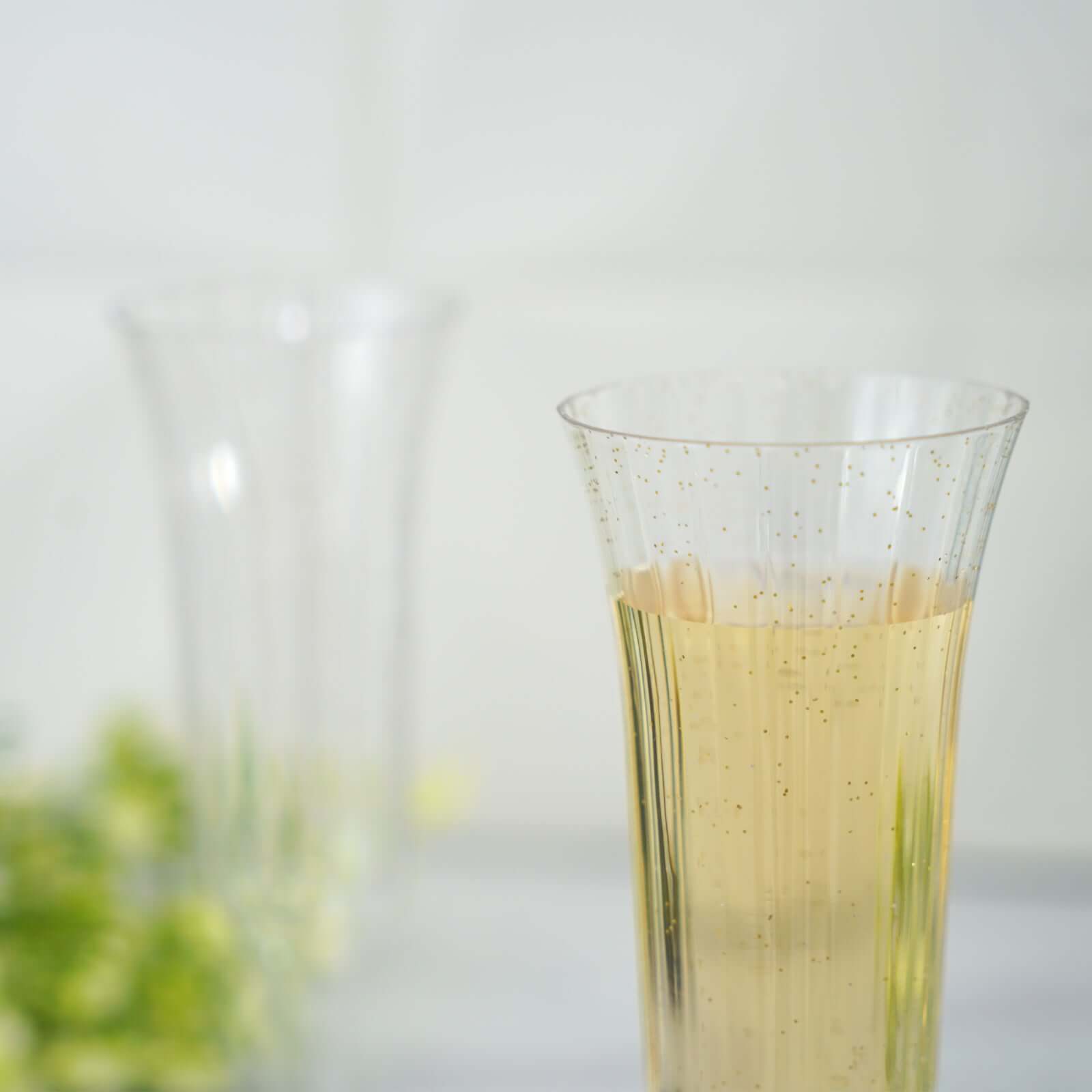 12-Piece Set of Lightweight 6oz Disposable Plastic Champagne Flutes with Clear/Gold Glitter Flared Design
