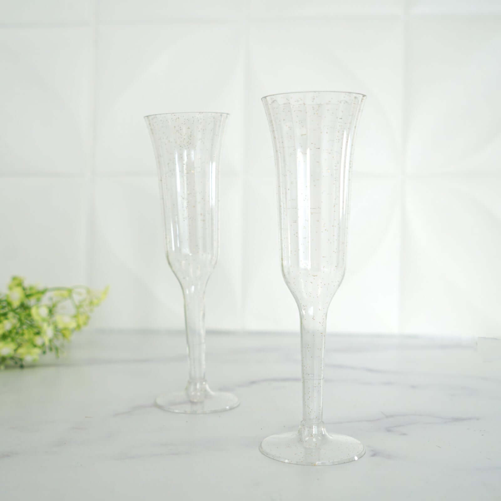 12-Piece Set of Lightweight 6oz Disposable Plastic Champagne Flutes with Clear/Gold Glitter Flared Design