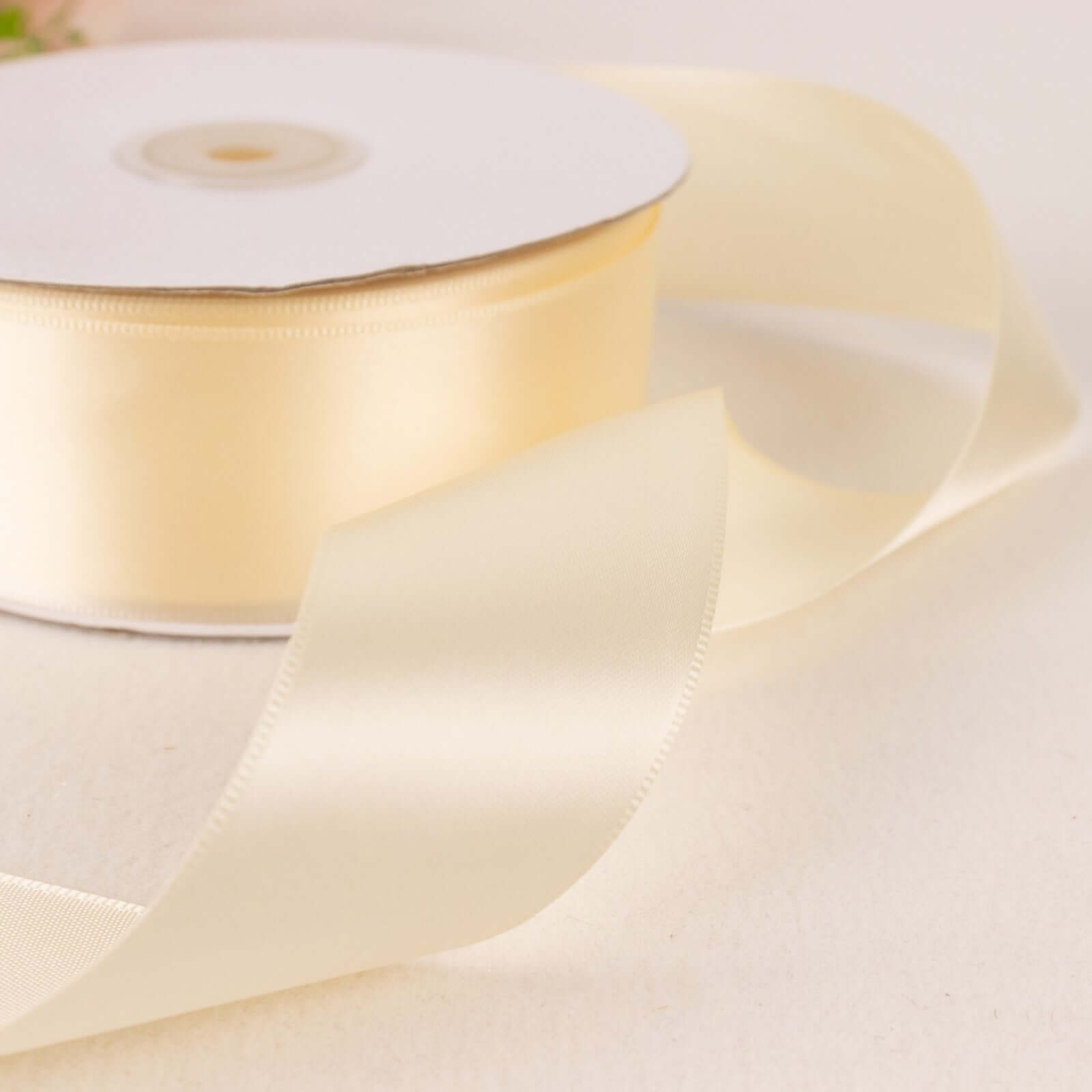 Get 50 Yards of 1.5-Inch Ivory Single-Face Decorative Polyester Satin Ribbon