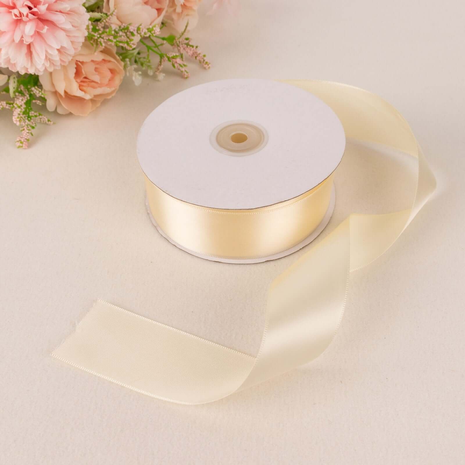 Get 50 Yards of 1.5-Inch Ivory Single-Face Decorative Polyester Satin Ribbon