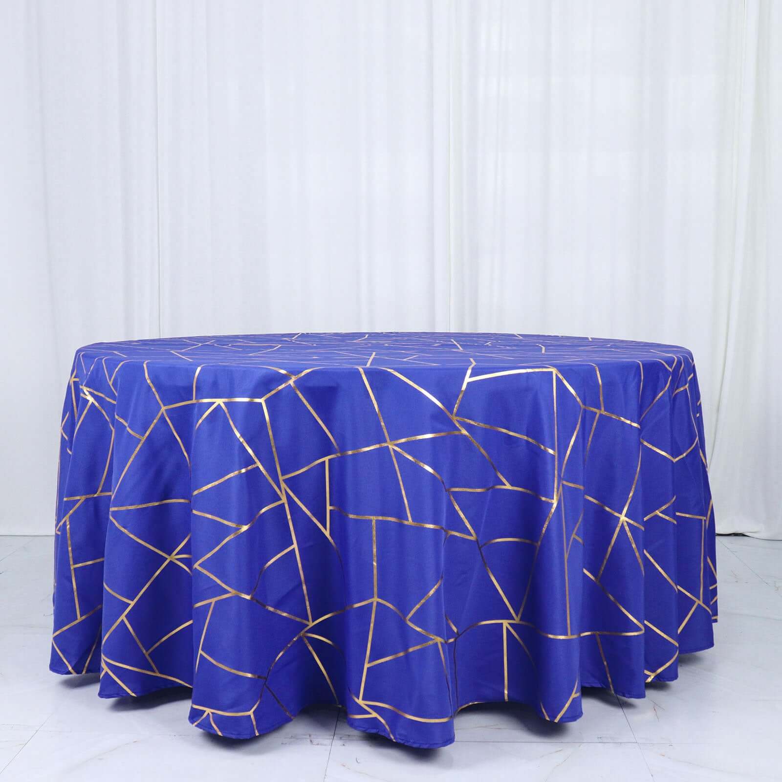 Wrinkle-Resistant Seamless Royal Blue Polyester Round Tablecloth with Gold Foil Geometric Design, 120' Dia.