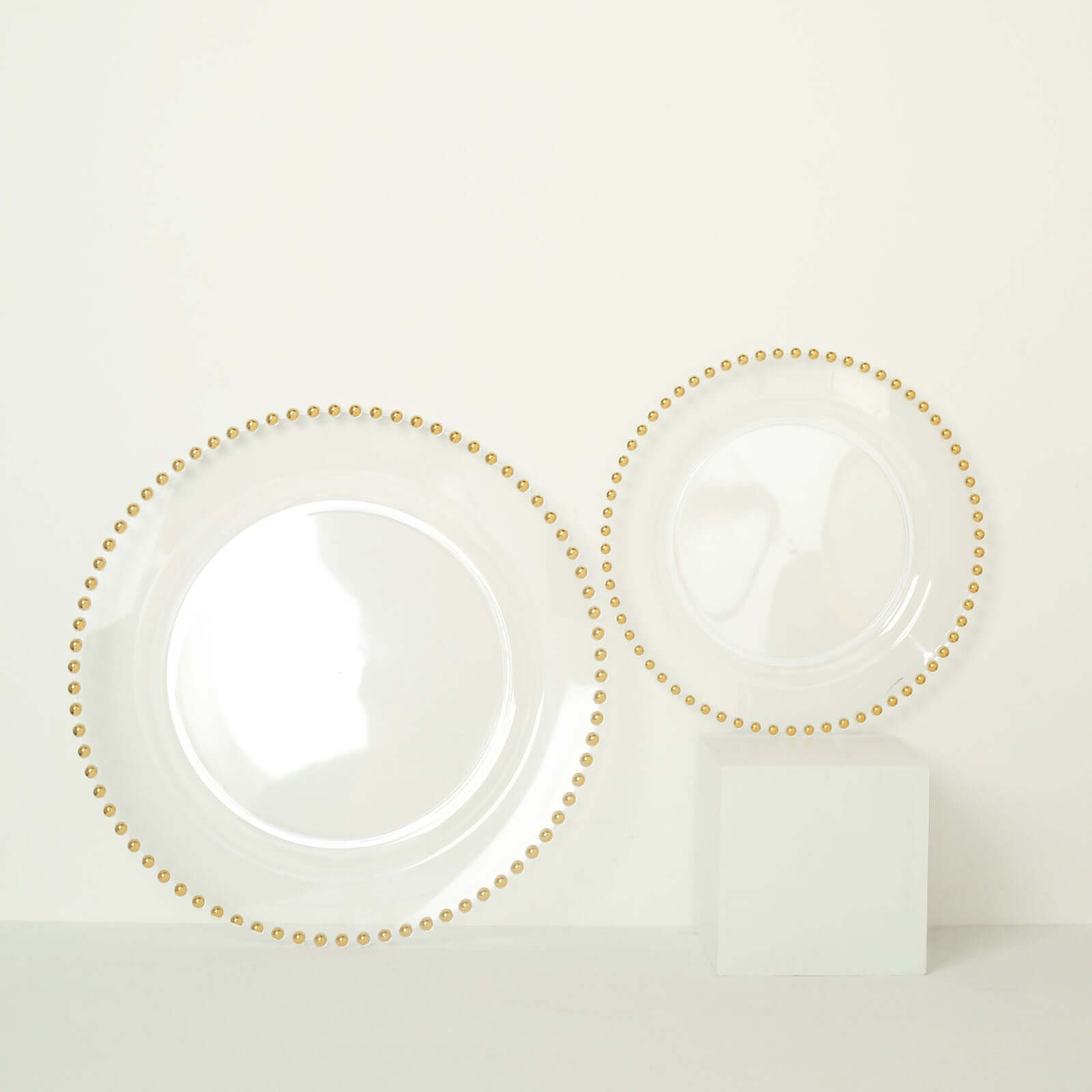 Get 10-Pack of Disposable Round Clear Plastic Dinner Plates with Gold Beaded Rim for Parties