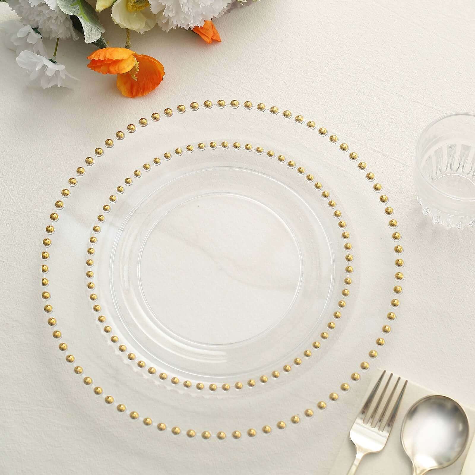 Get 10-Pack of Disposable Round Clear Plastic Dinner Plates with Gold Beaded Rim for Parties