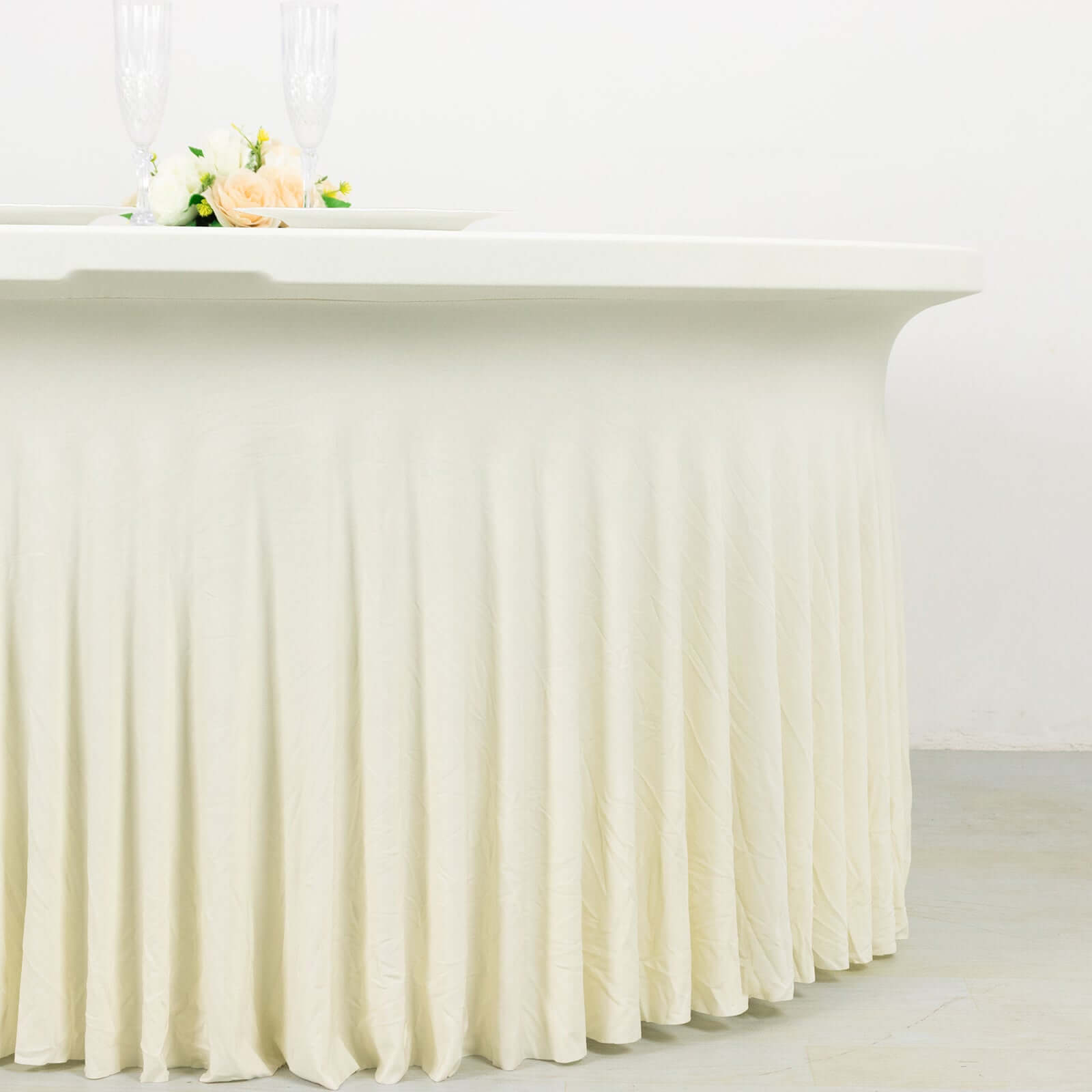 Ivory Spandex 5ft Round Table Skirt with Wave - like Style: A Stylish Table Cover