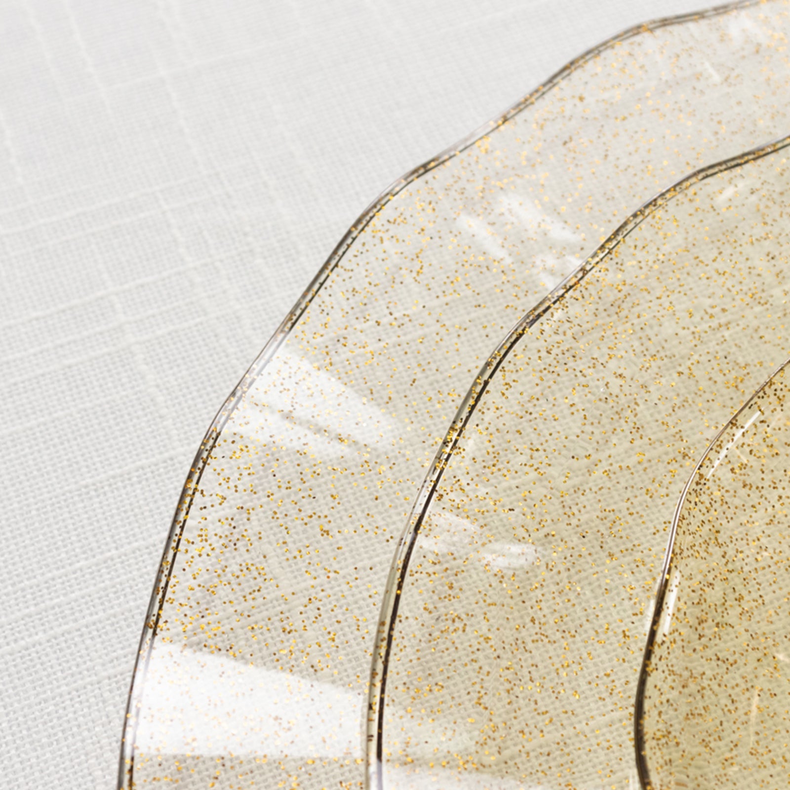 Get 10-Pack of Sturdy Disposable Gold Glitter Round Plastic Dinner Plates with Ruffled Rim