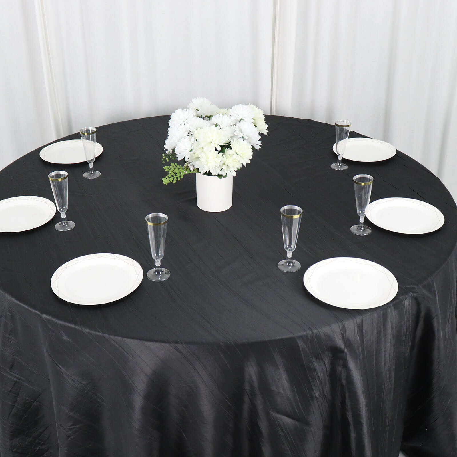 Black 132-Inch Seamless Accordion Crinkle Taffeta Round Tablecloth for Elegant Occasions