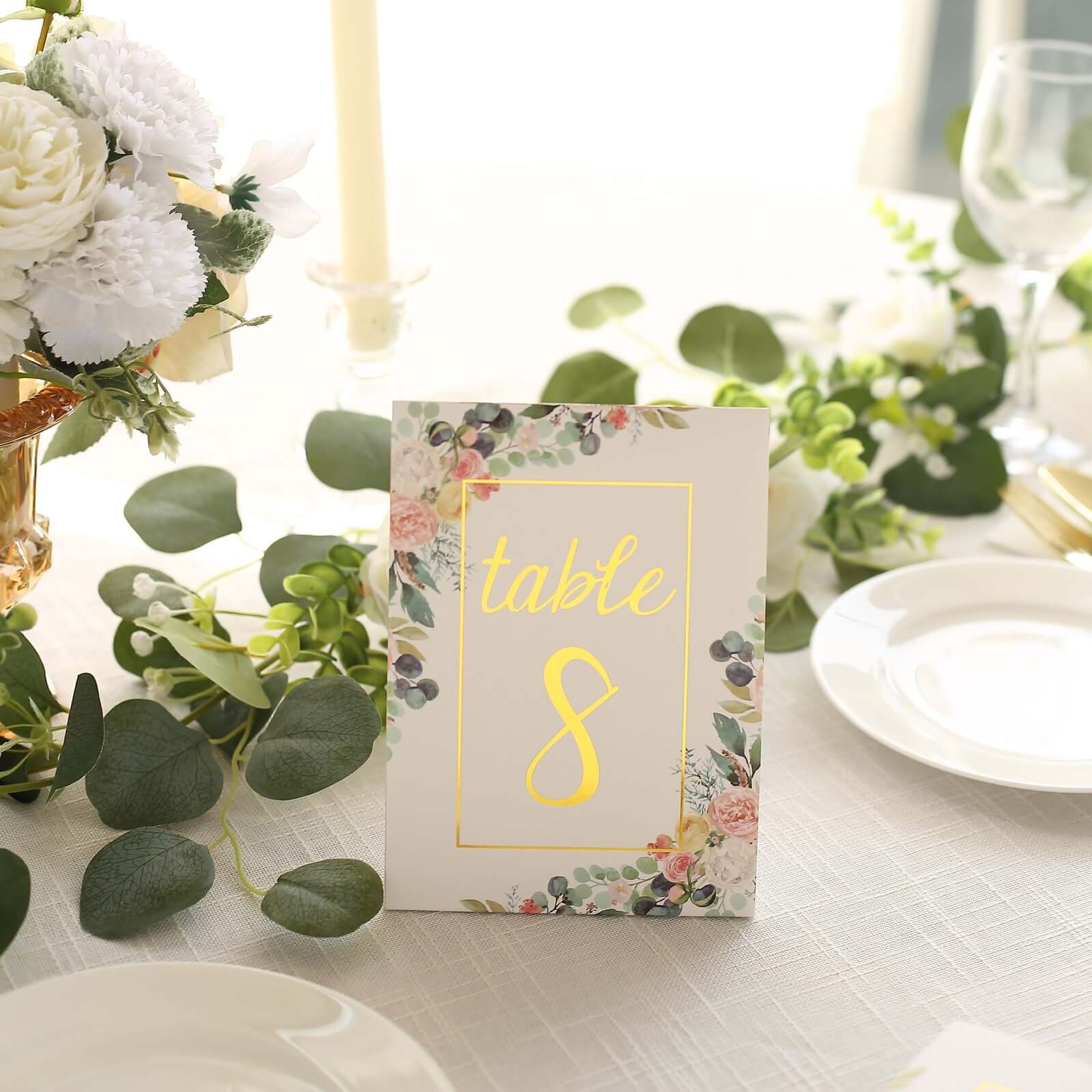 Get 25-Pack Free-Standing Double-Sided Wedding Table Numbers 1-25 with White Peony & Gold Foil Design