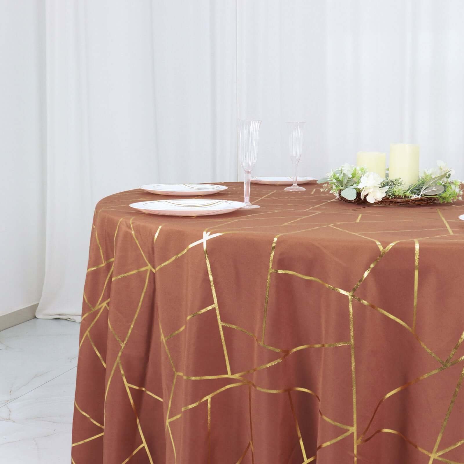 Wrinkle-Resistant Seamless Polyester Round Tablecloth in Terracotta with Gold Foil Geometric Design
