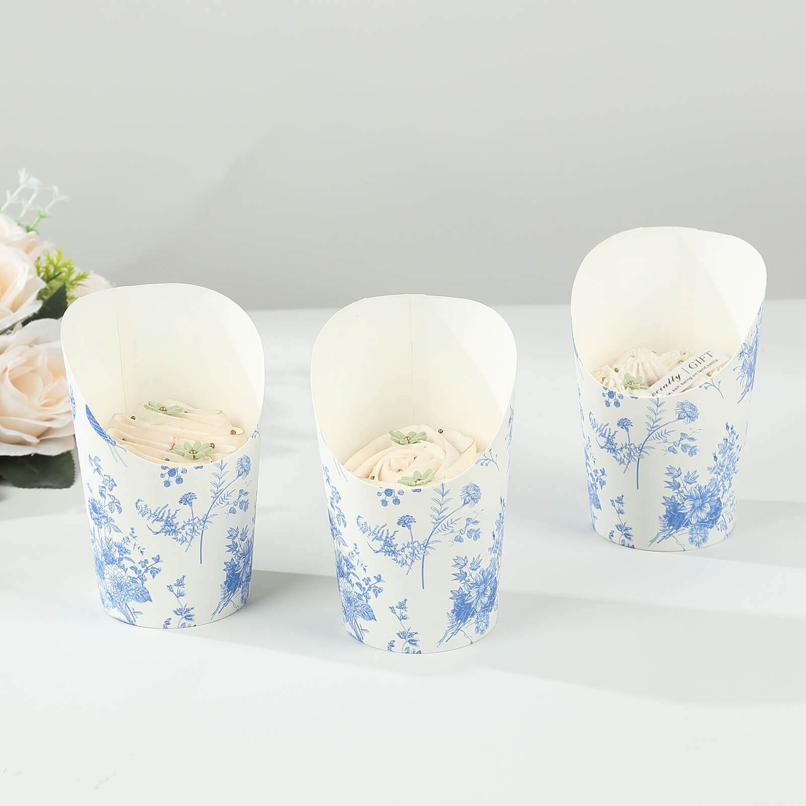 Get 50-Pack 14oz Paper Popcorn Box Cone Cups with French Toile Floral in White & Blue for Snacks
