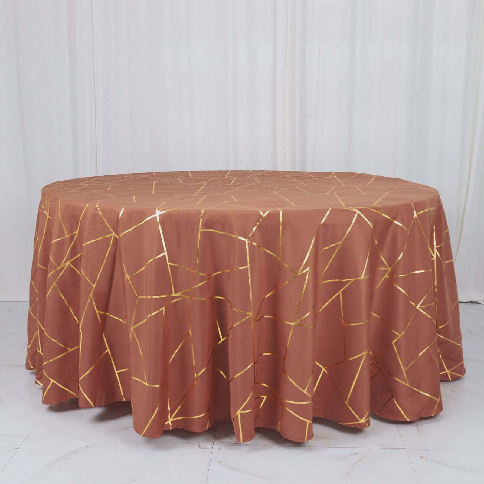 Wrinkle-Resistant Seamless Polyester Round Tablecloth in Terracotta with Gold Foil Geometric Design