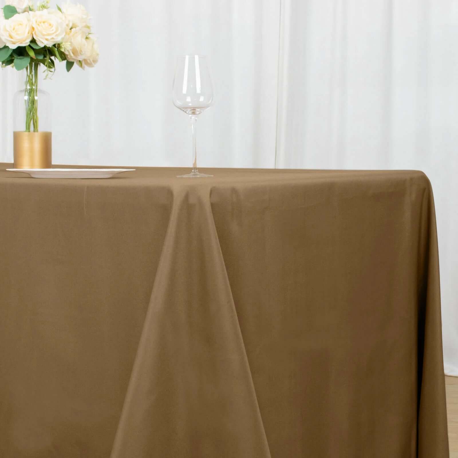 Get This Seamless, Wrinkle-Resistant 90x132 Polyester Rectangle Taupe Tablecloth Now!