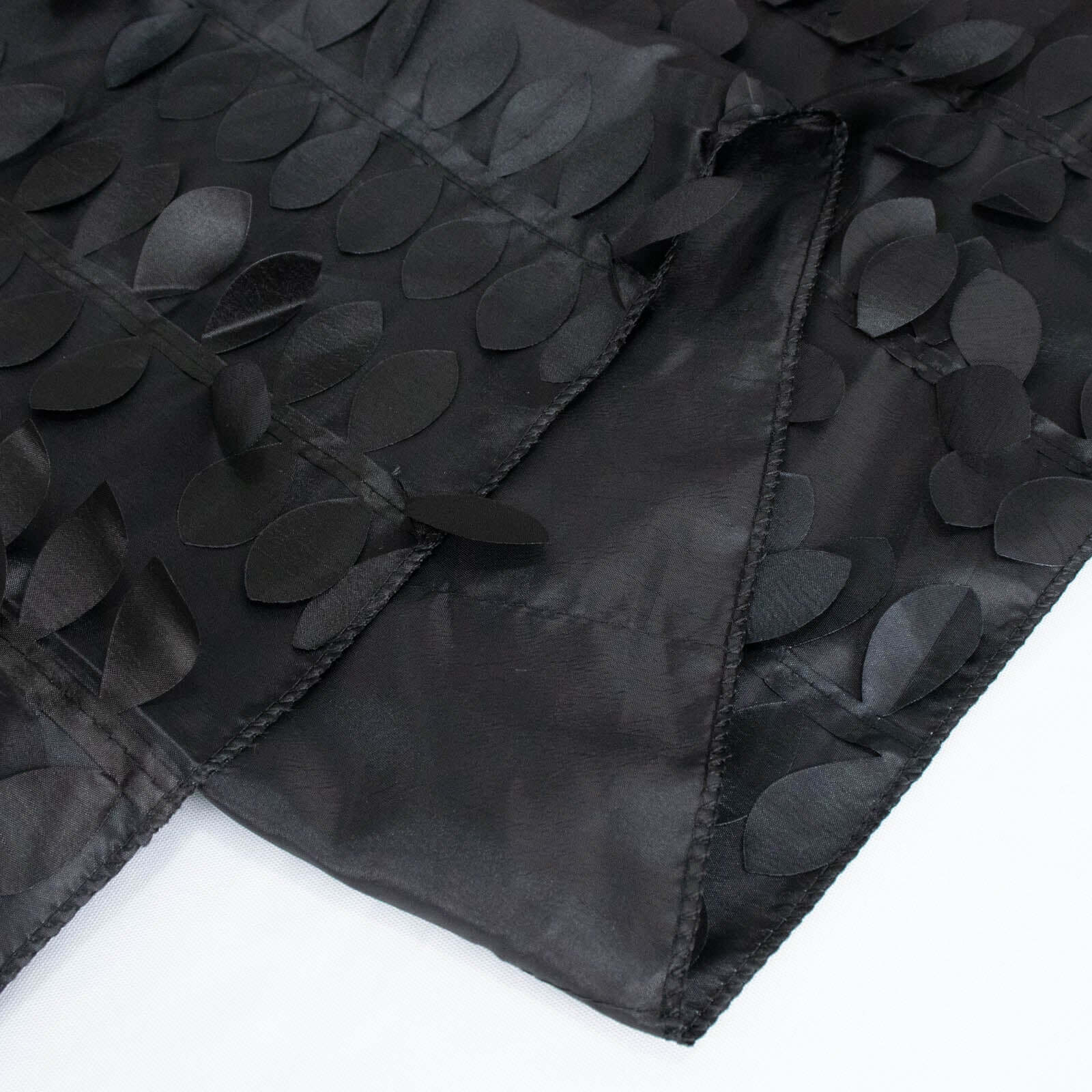 Black 132-Inch Round Taffeta Tablecloth with 3D Leaf Petal Seamless Design