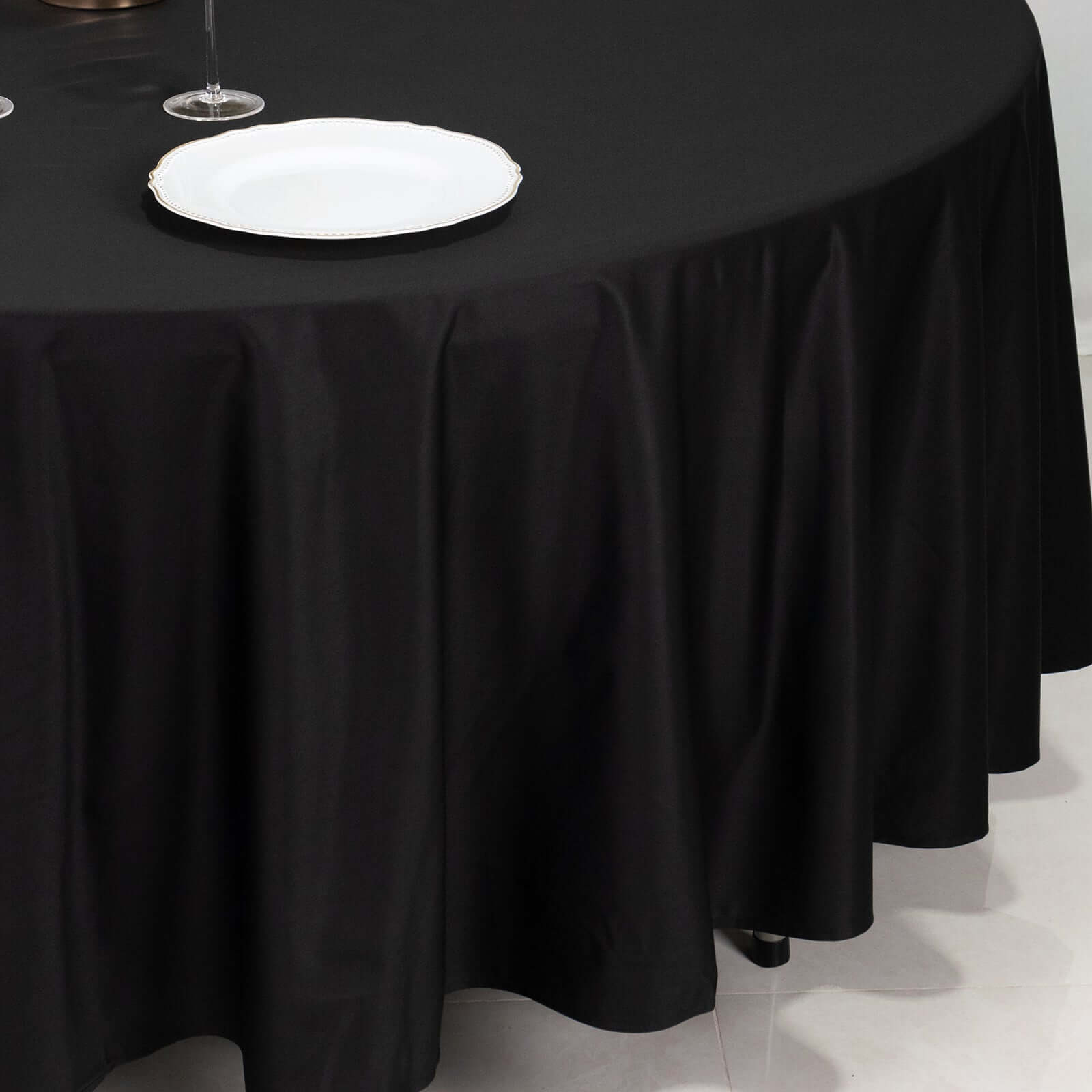 Black 108' Premium Wrinkle-Free & Stain-Resistant Scuba Round Tablecloth for Elegant Events