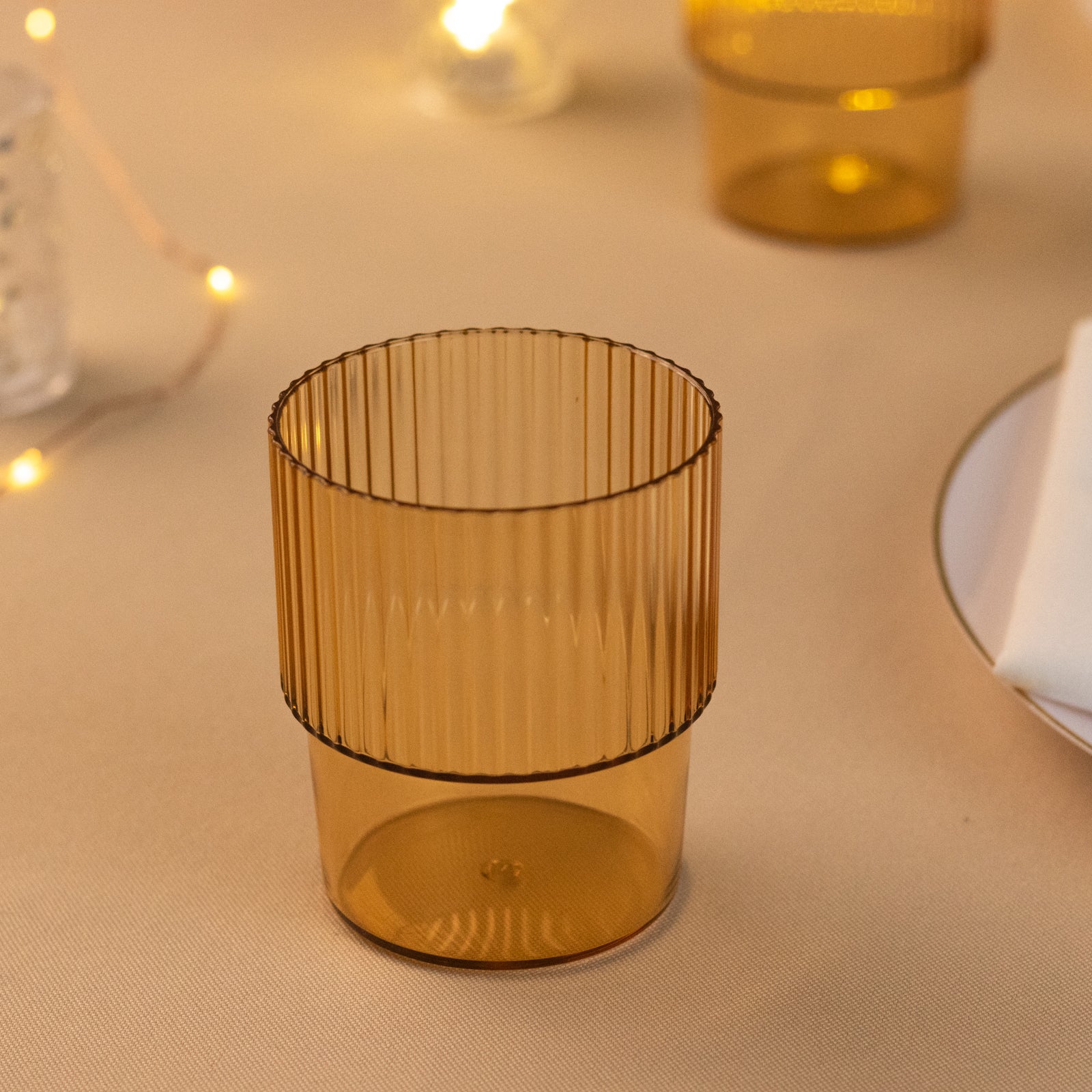 12-Piece Set of Reusable 7oz Stackable Amber Gold Plastic Drinking Glasses with Ribbed Pattern
