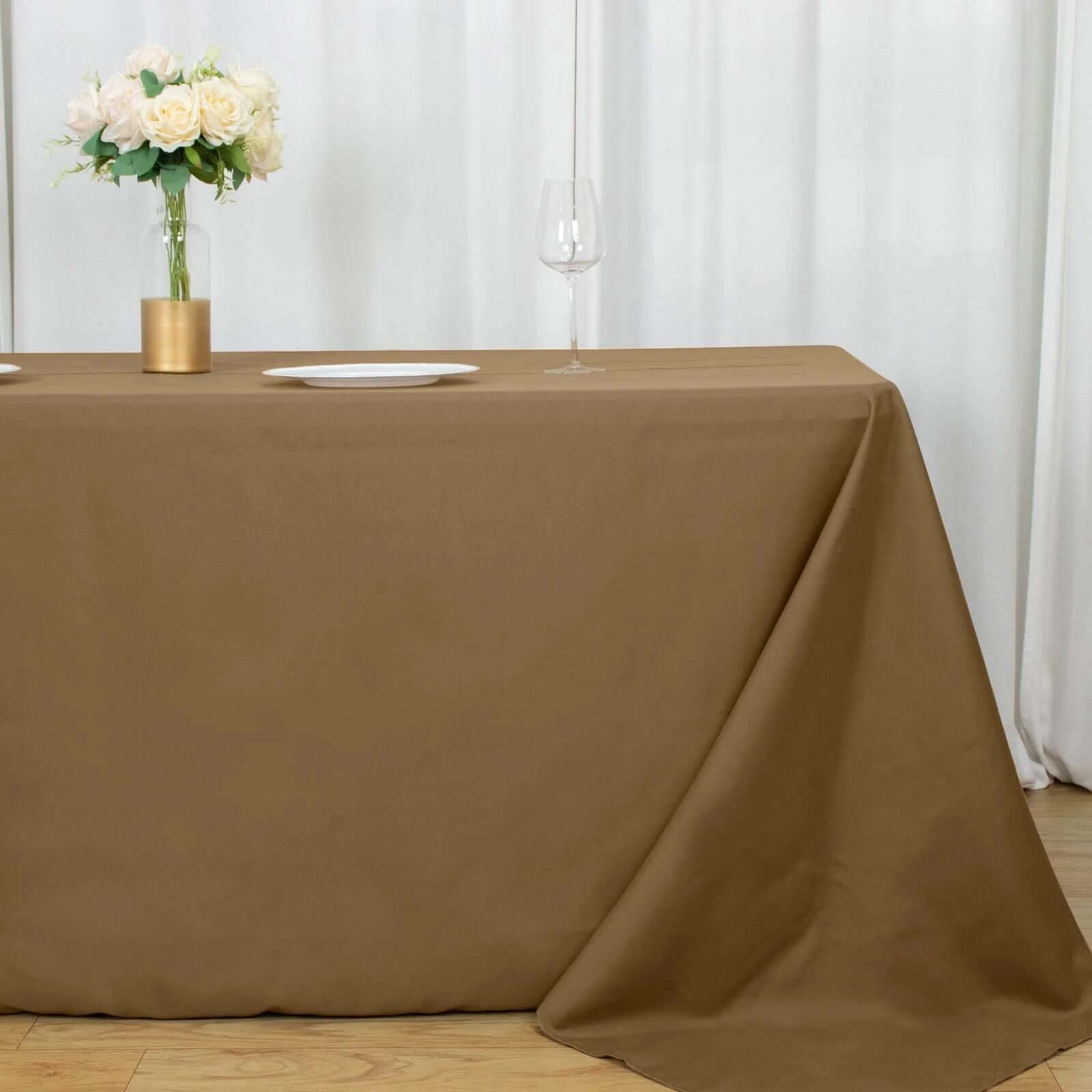 Get This Seamless, Wrinkle-Resistant 90x132 Polyester Rectangle Taupe Tablecloth Now!