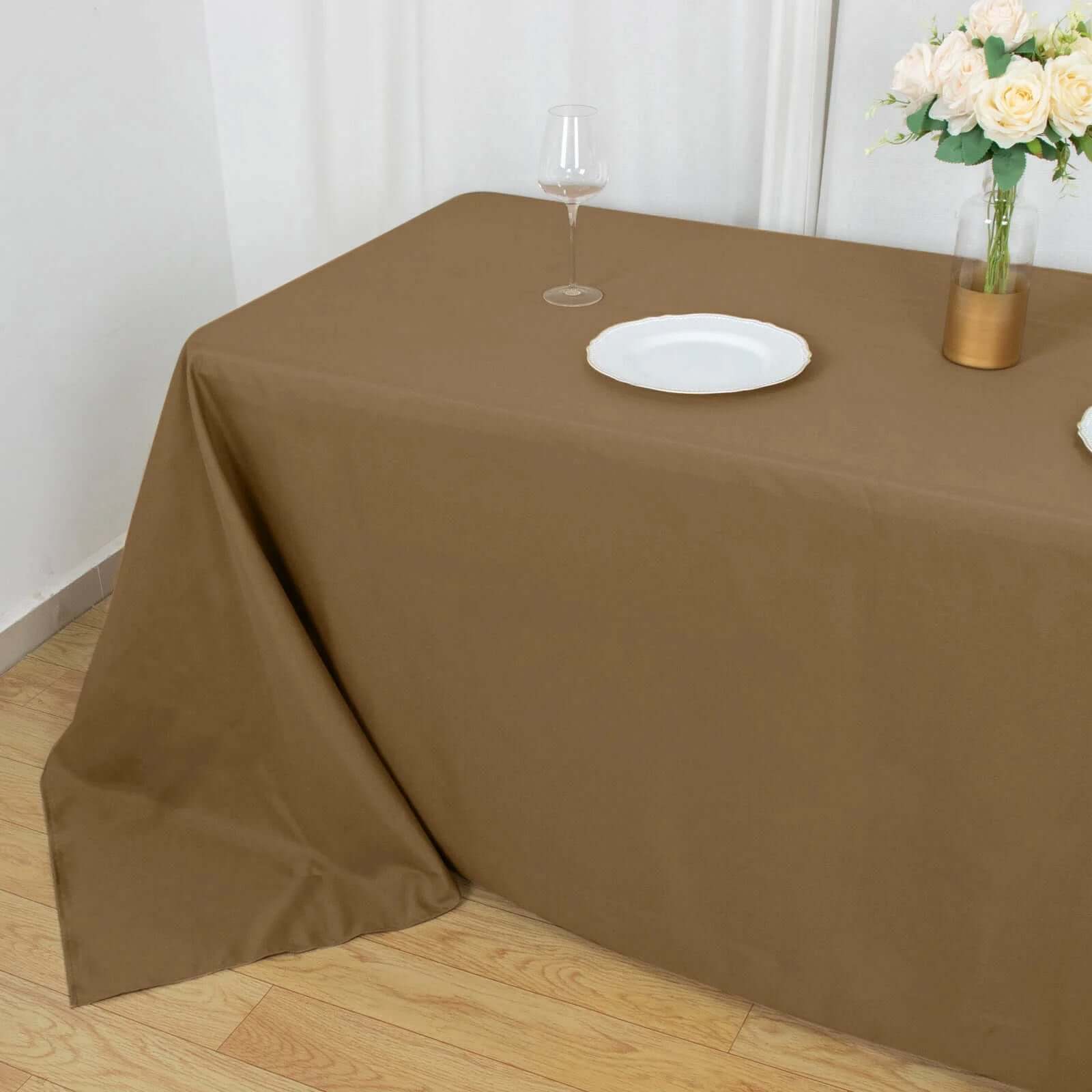 Get This Seamless, Wrinkle-Resistant 90x132 Polyester Rectangle Taupe Tablecloth Now!