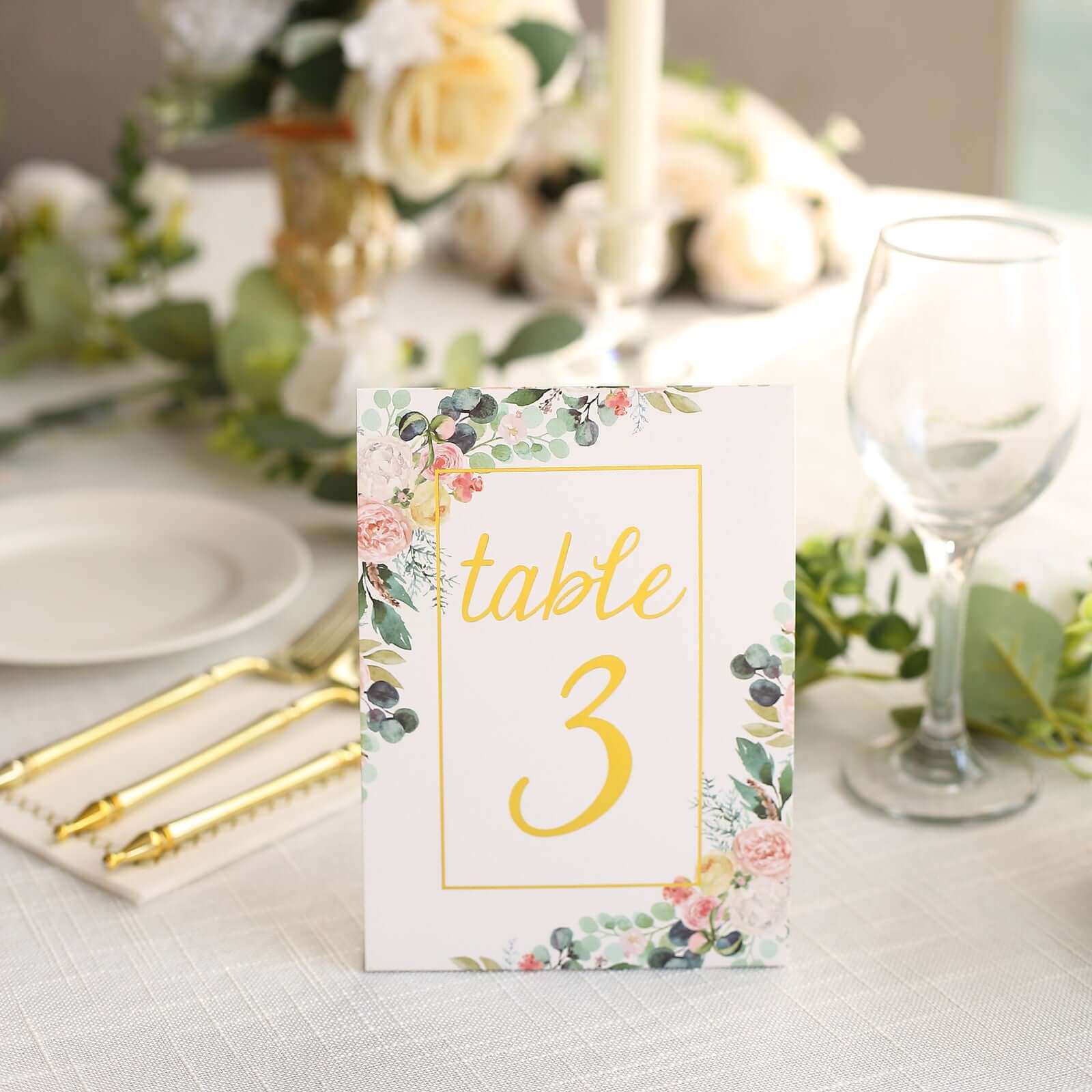 Get 25-Pack Free-Standing Double-Sided Wedding Table Numbers 1-25 with White Peony & Gold Foil Design