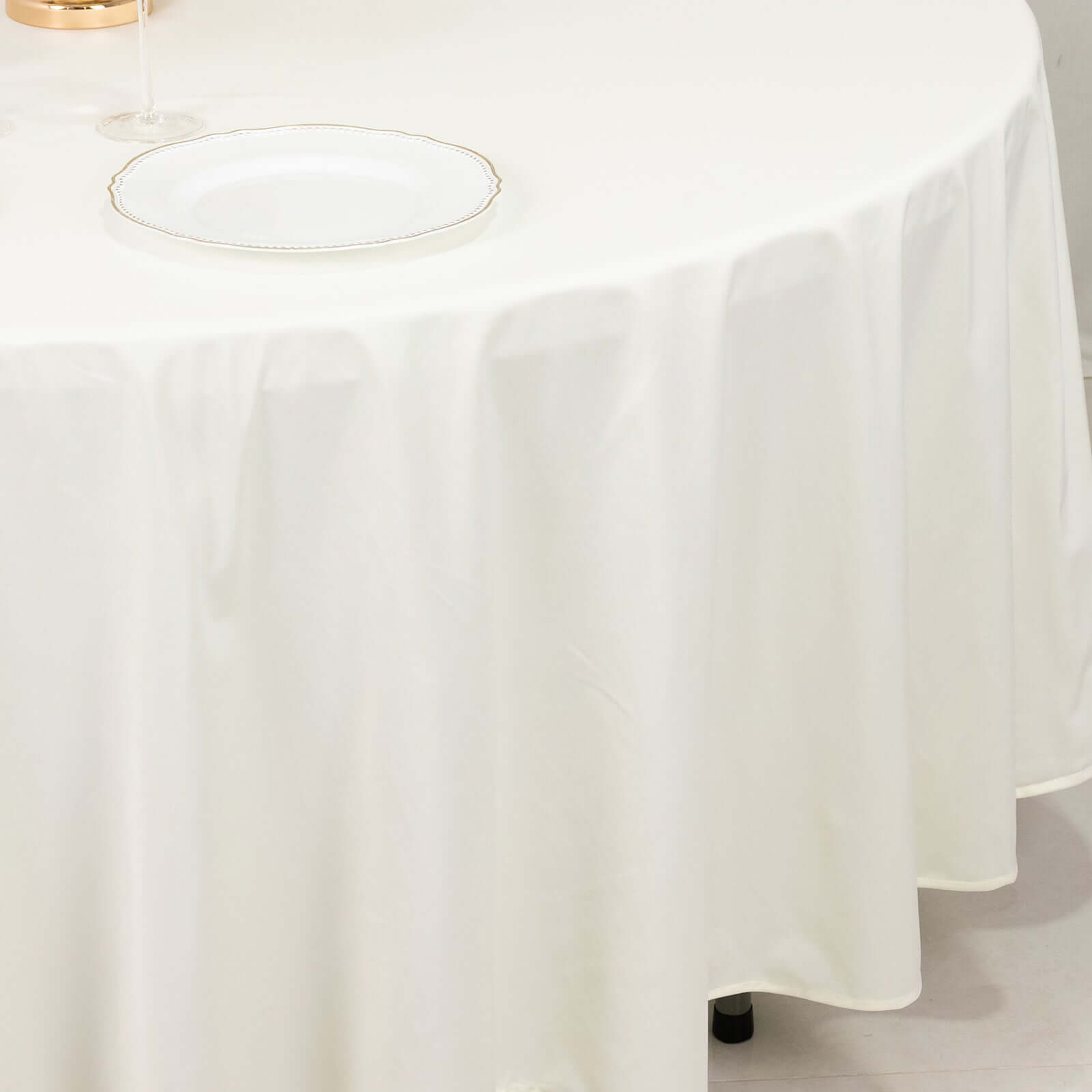 Ivory Premium Wrinkle-Free & Stain-Resistant 108' Scuba Round Tablecloth