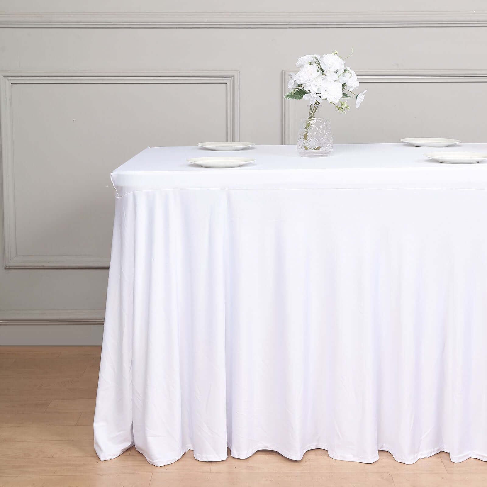 Stylish White Spandex Table Skirt with Wavy Effect for Weddings, Banquets & Trade Shows