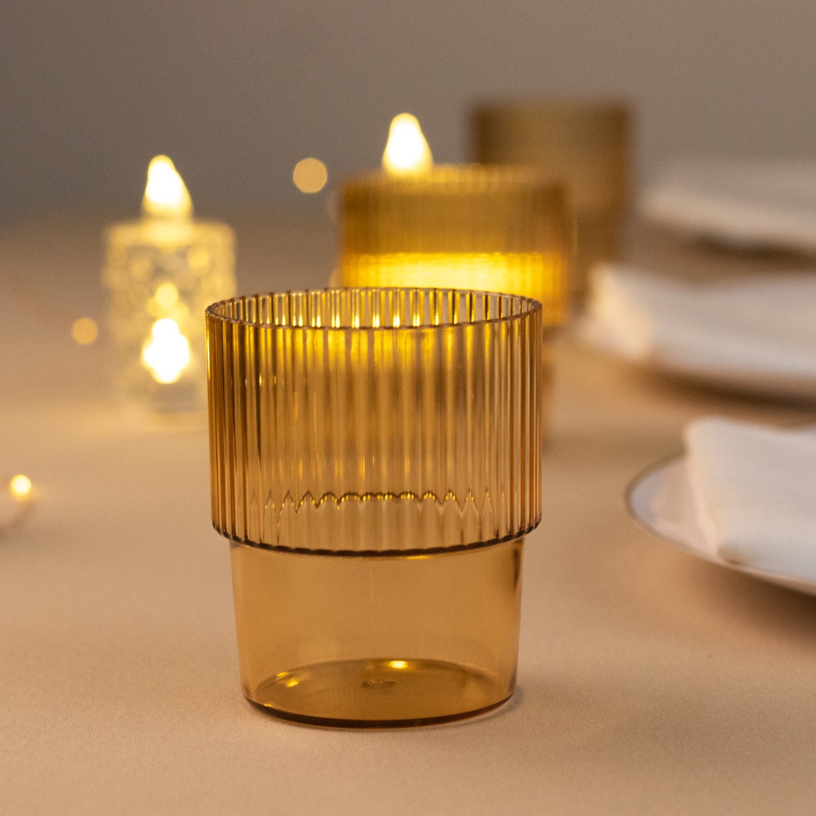 12-Piece Set of Reusable 7oz Stackable Amber Gold Plastic Drinking Glasses with Ribbed Pattern