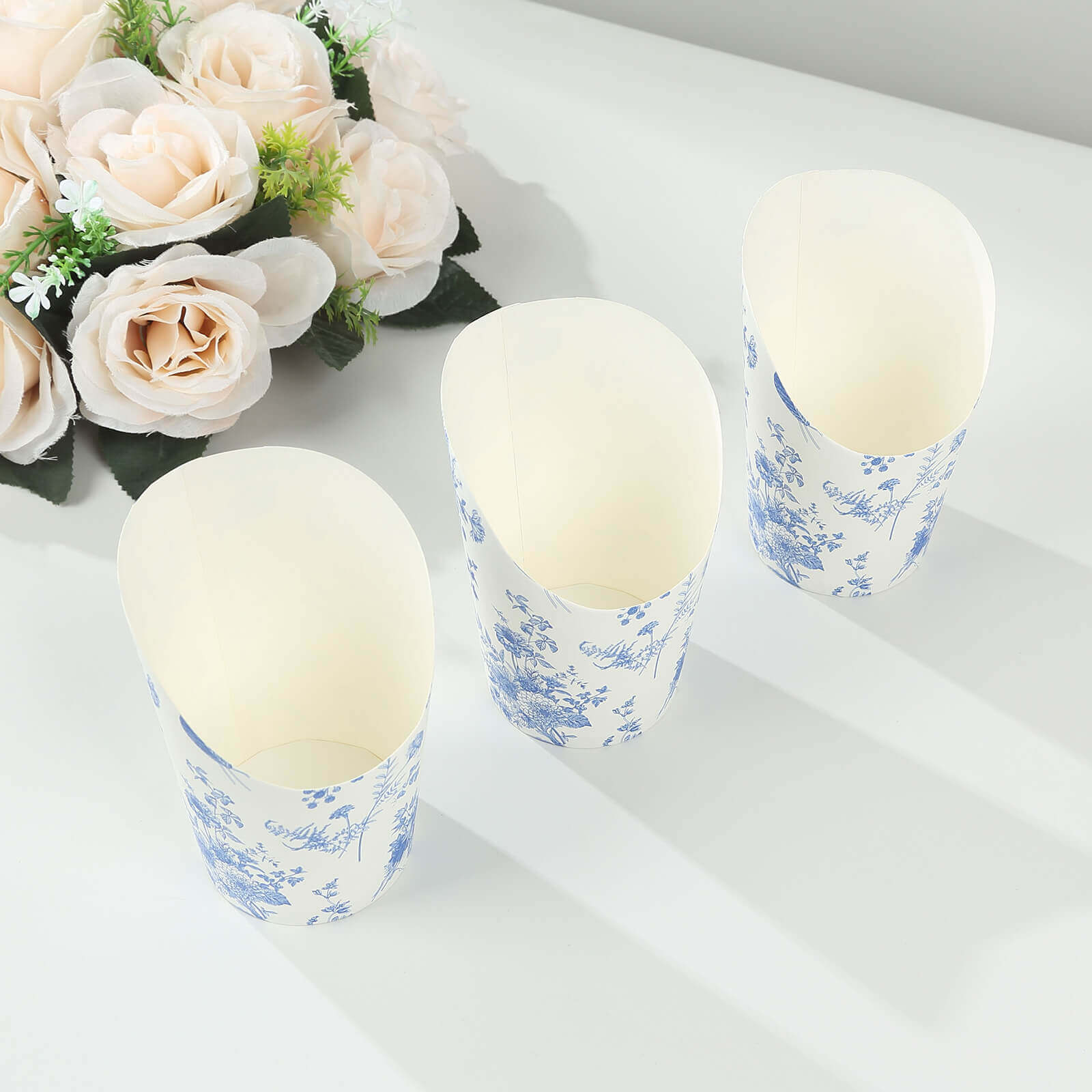 Get 50-Pack 14oz Paper Popcorn Box Cone Cups with French Toile Floral in White & Blue for Snacks