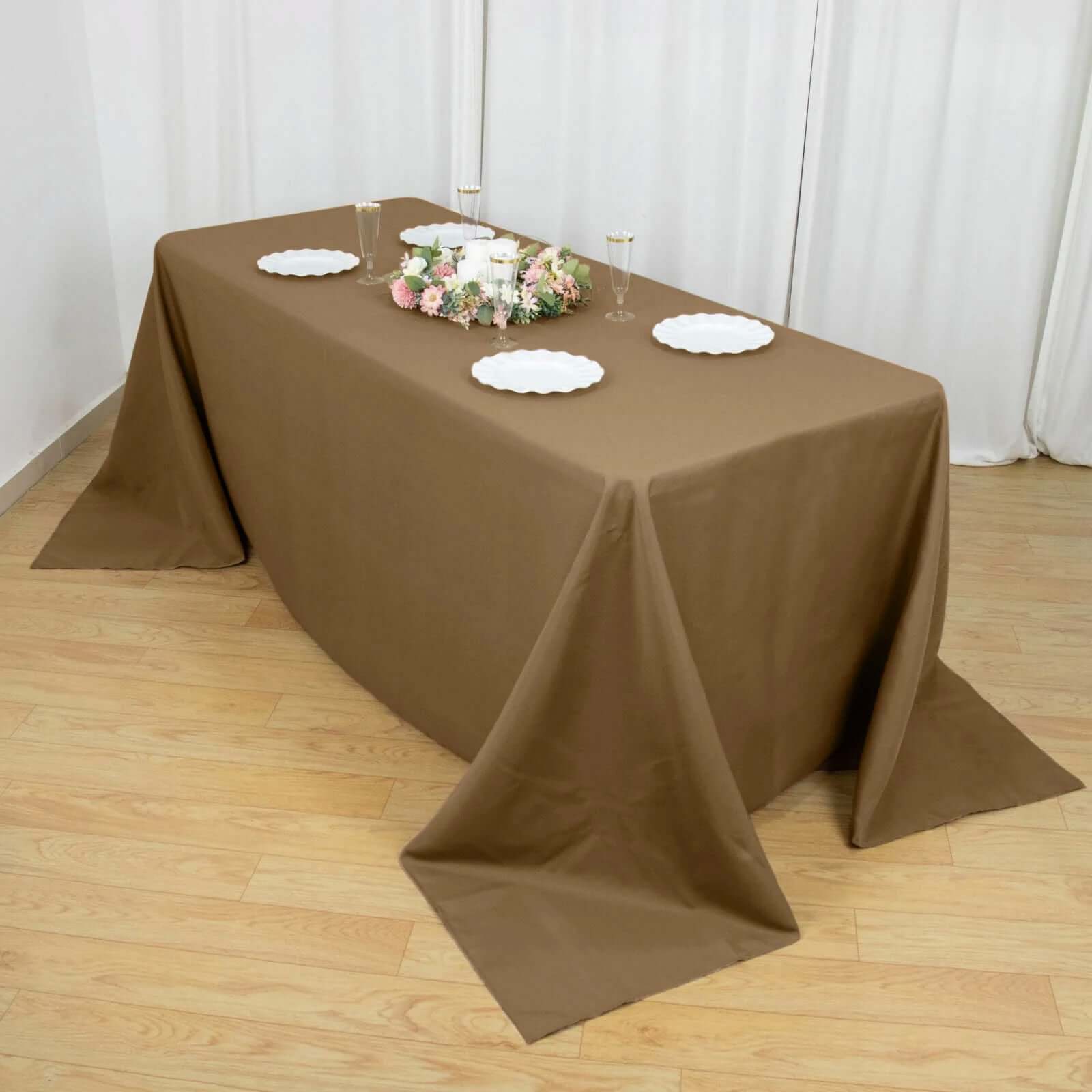 Get This Seamless, Wrinkle-Resistant 90x132 Polyester Rectangle Taupe Tablecloth Now!
