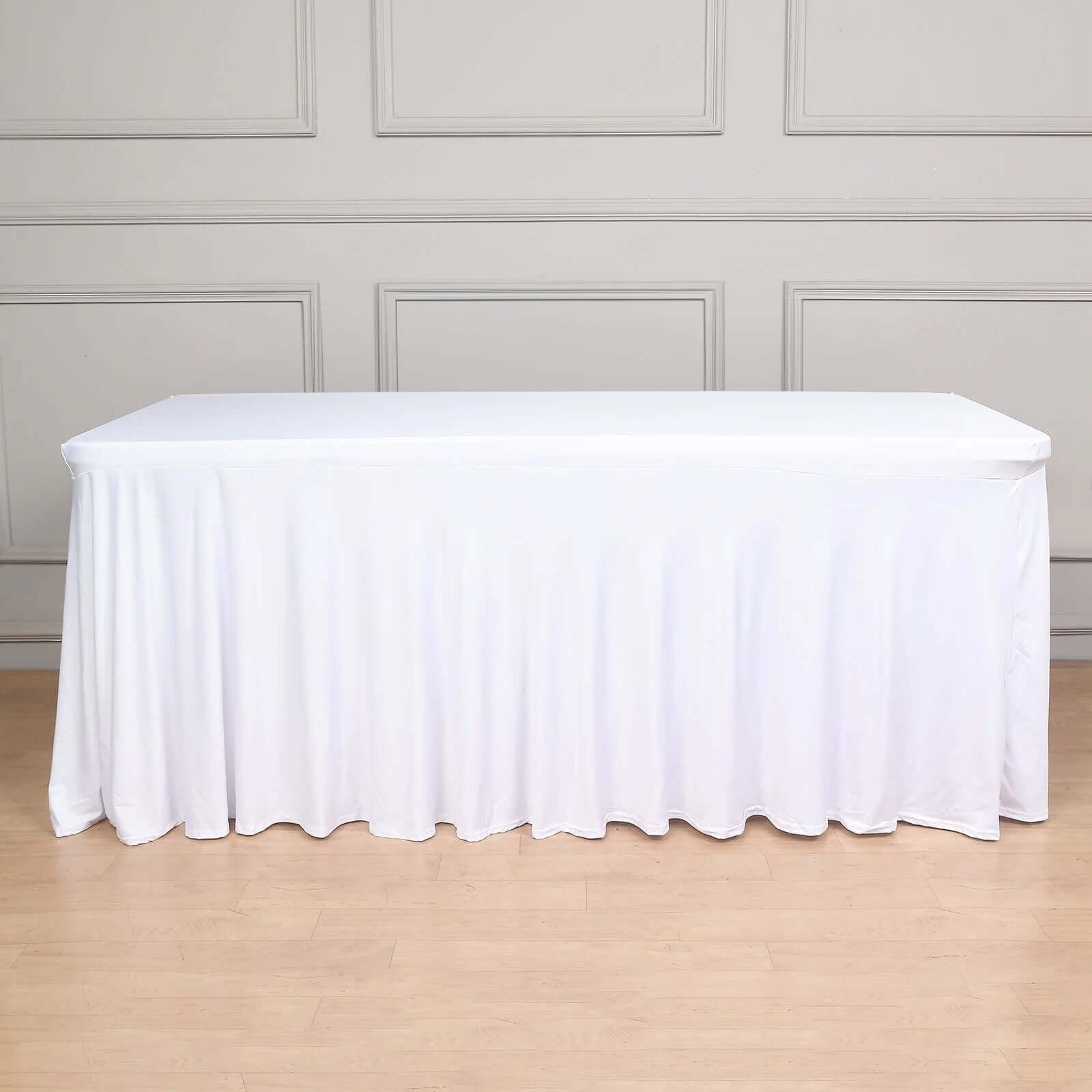 Stylish White Spandex Table Skirt with Wavy Effect for Weddings, Banquets & Trade Shows