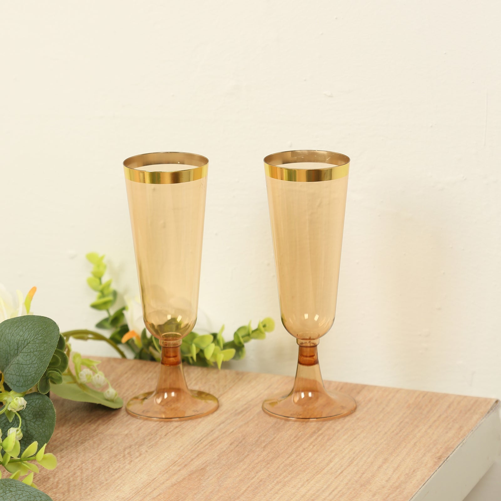 Stylish Disposable 5oz Plastic Champagne Flutes in Transparent Amber Gold with Gold Rim - 12-Pack for Parties