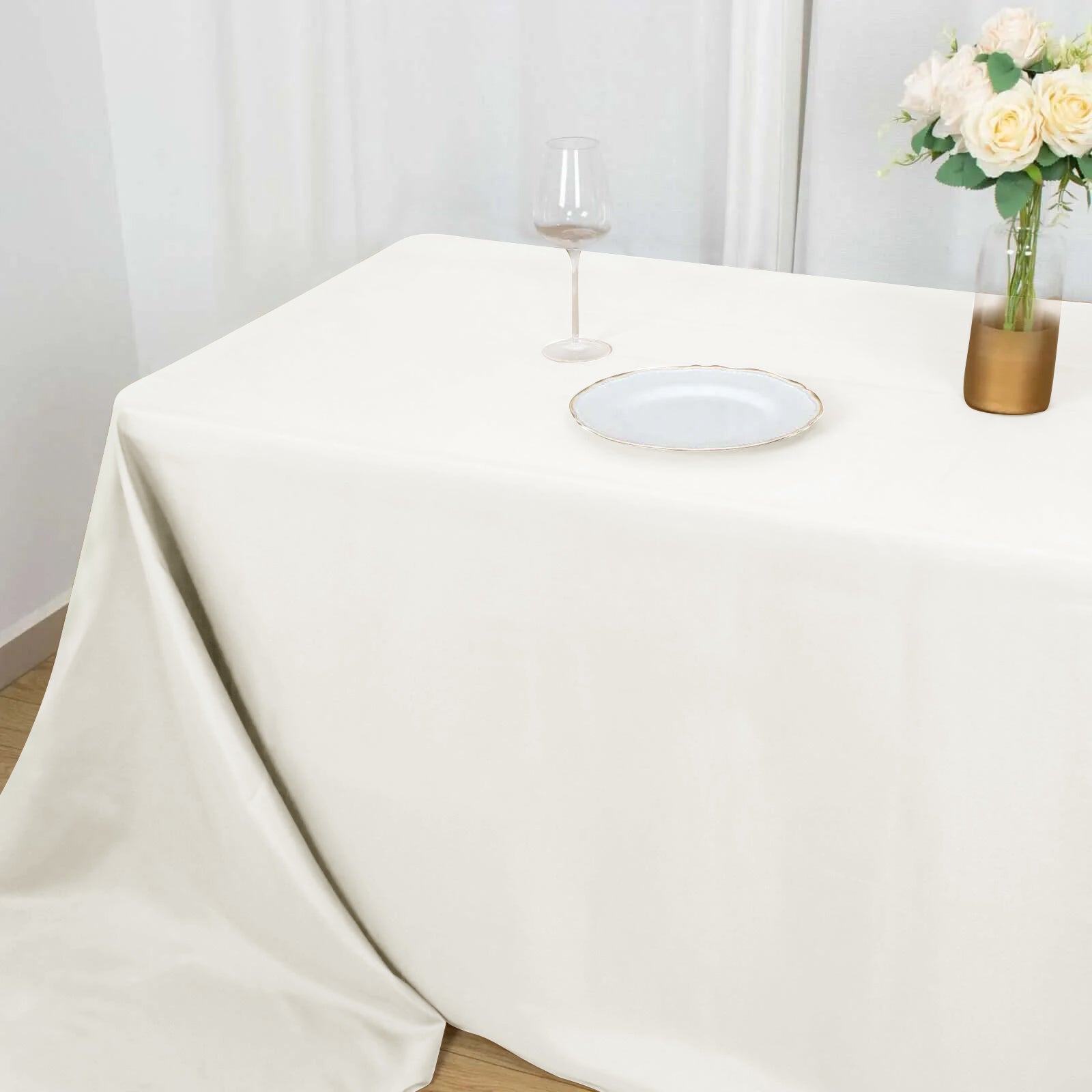 Ivory Polyester Seamless Wrinkle-Resistant 90x156 Rectangle Tablecloth - Ideal for Events