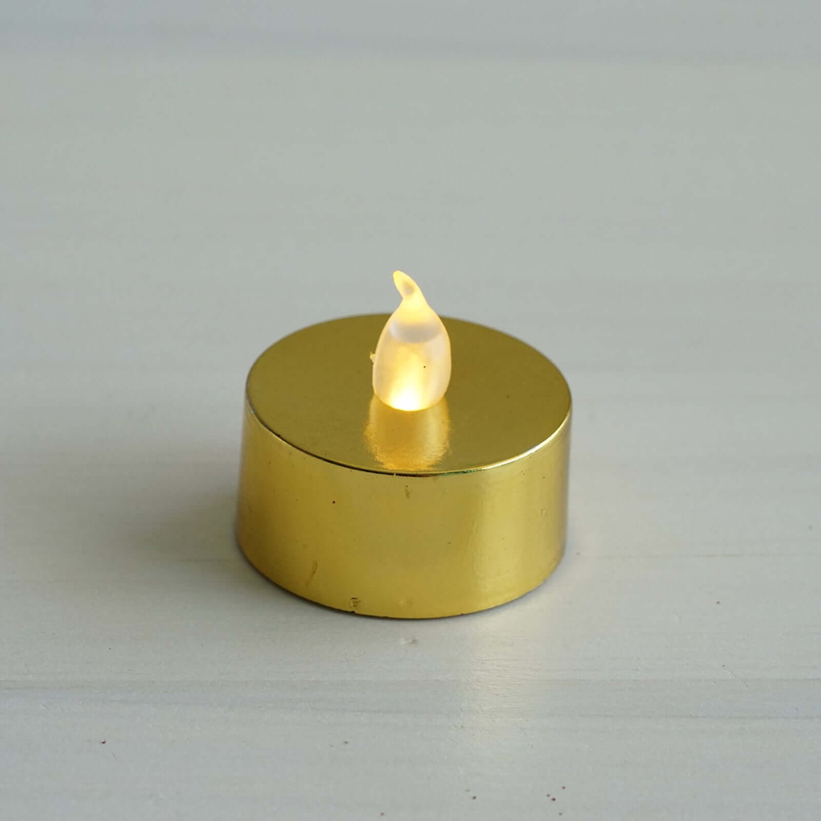 Amazing 12-Pack Reusable Flameless LED Tealight Candles with Metallic Gold Design, Battery Operated
