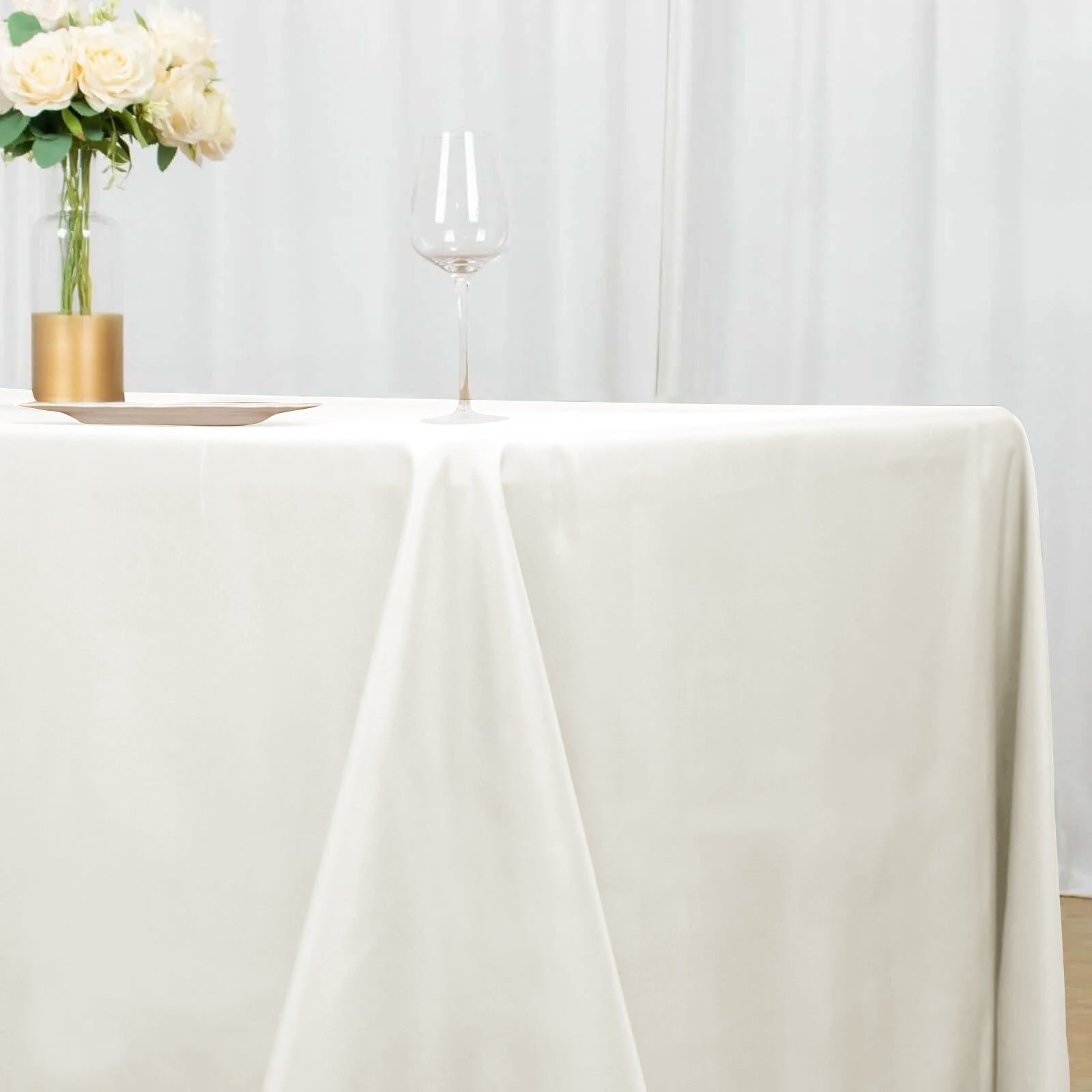 Ivory Polyester Seamless Wrinkle-Resistant 90x156 Rectangle Tablecloth - Ideal for Events
