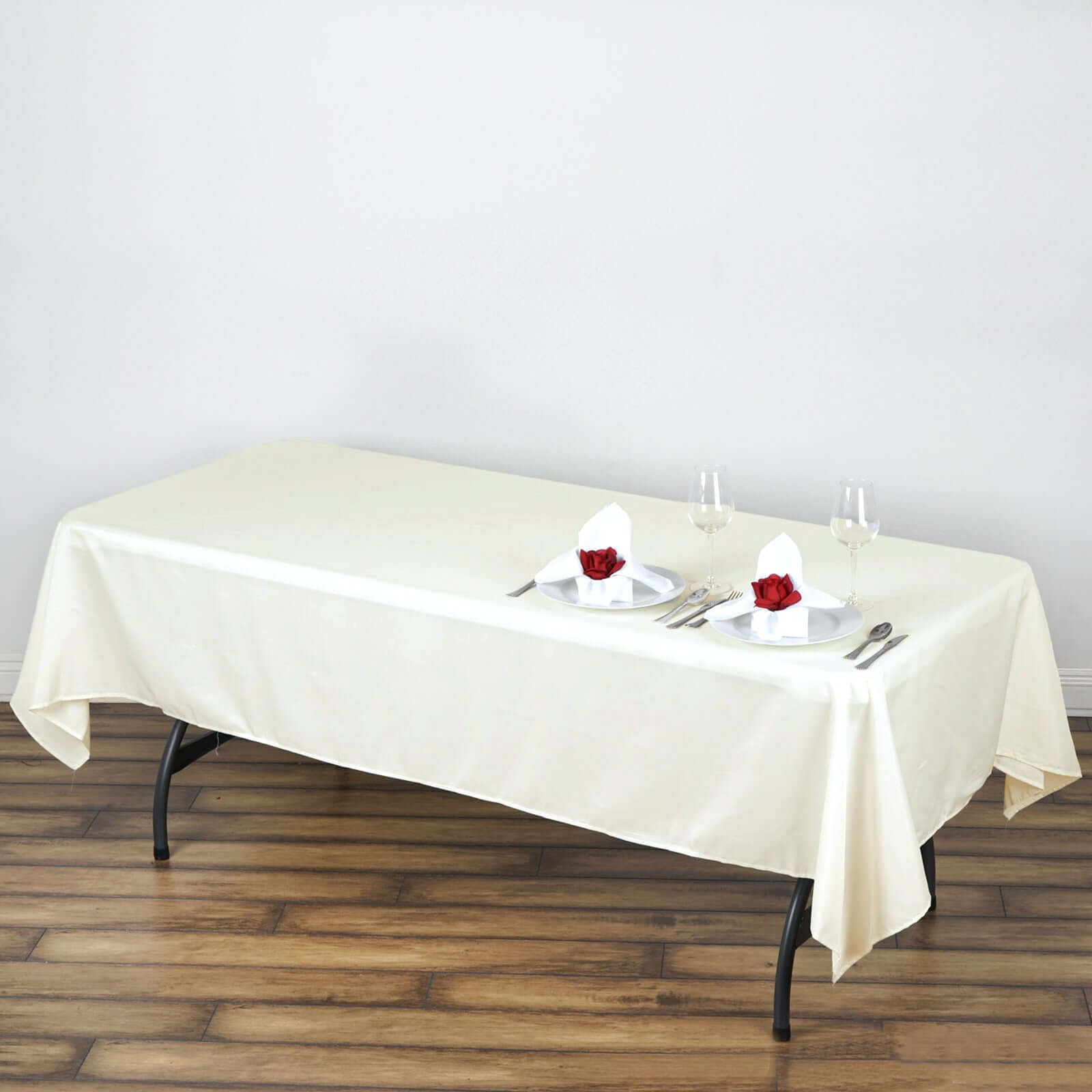 Durable and Elegant Ivory 60x102 Rectangle Polyester Tablecloth