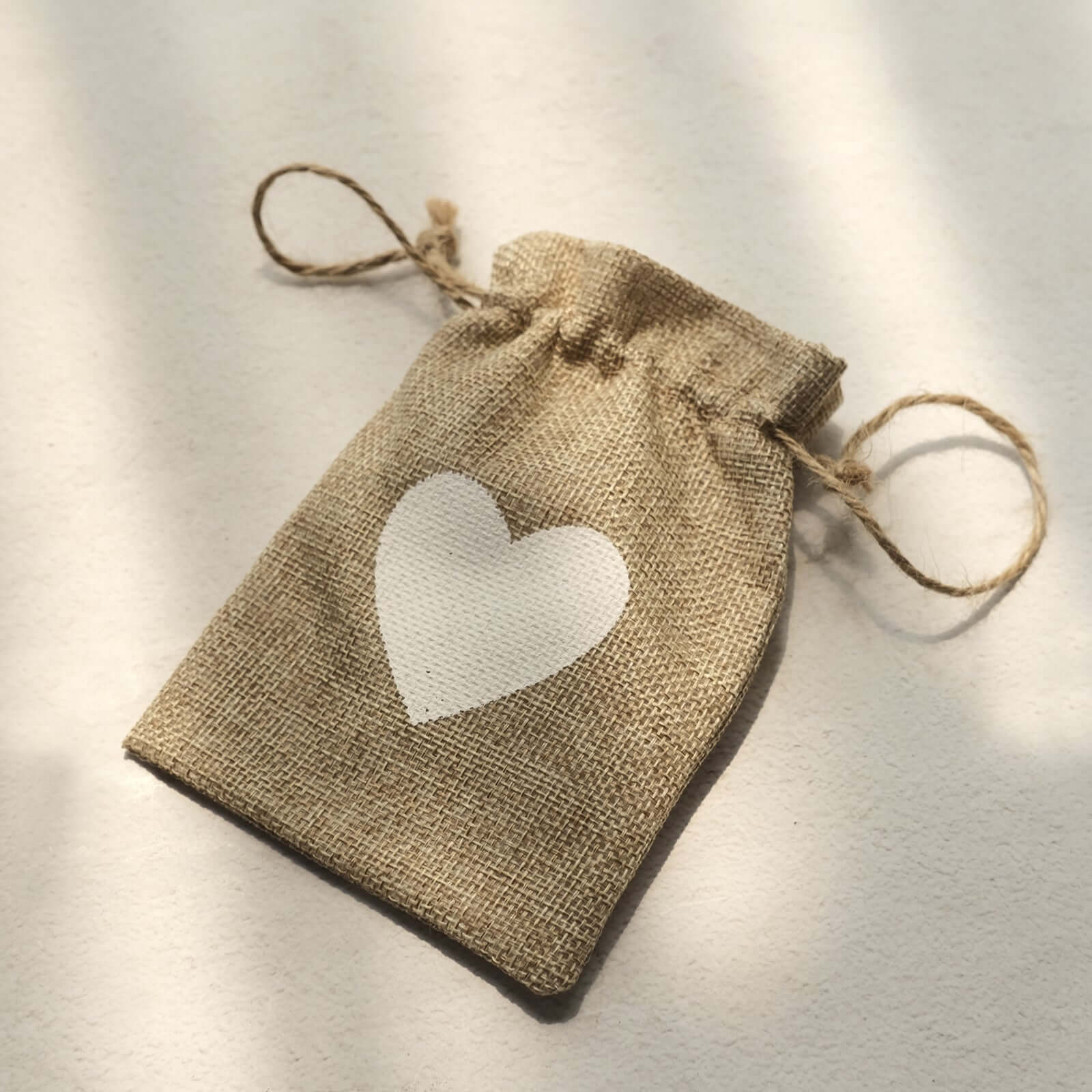 20-Piece Set of 4x5 Natural Ivory Heart-Printed Jute Burlap Drawstring Gift Bags for Rustic Weddings