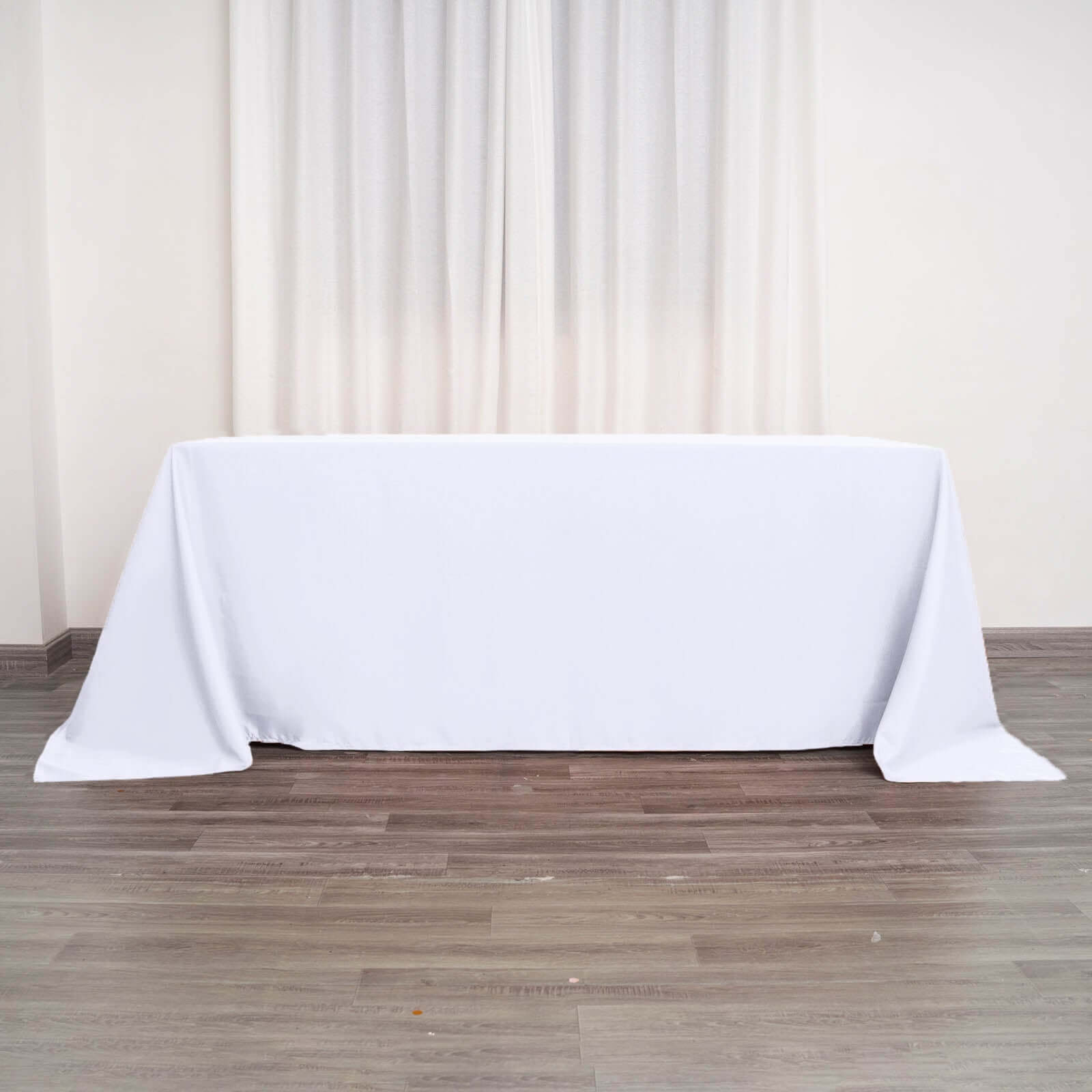Get This White 90x132 Polyester Rectangle Tablecloth for Luxurious Celebrations