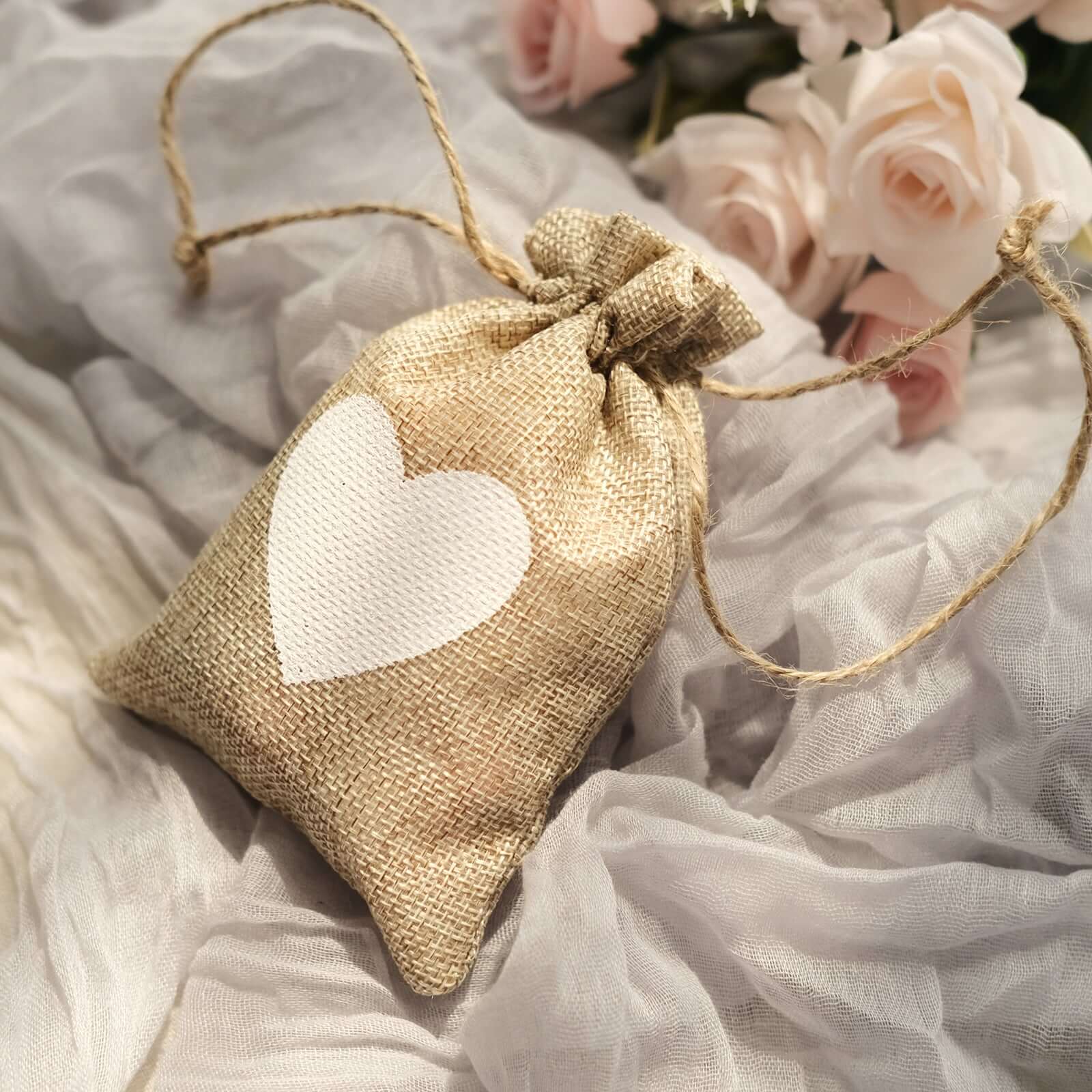 20-Piece Set of 4x5 Natural Ivory Heart-Printed Jute Burlap Drawstring Gift Bags for Rustic Weddings