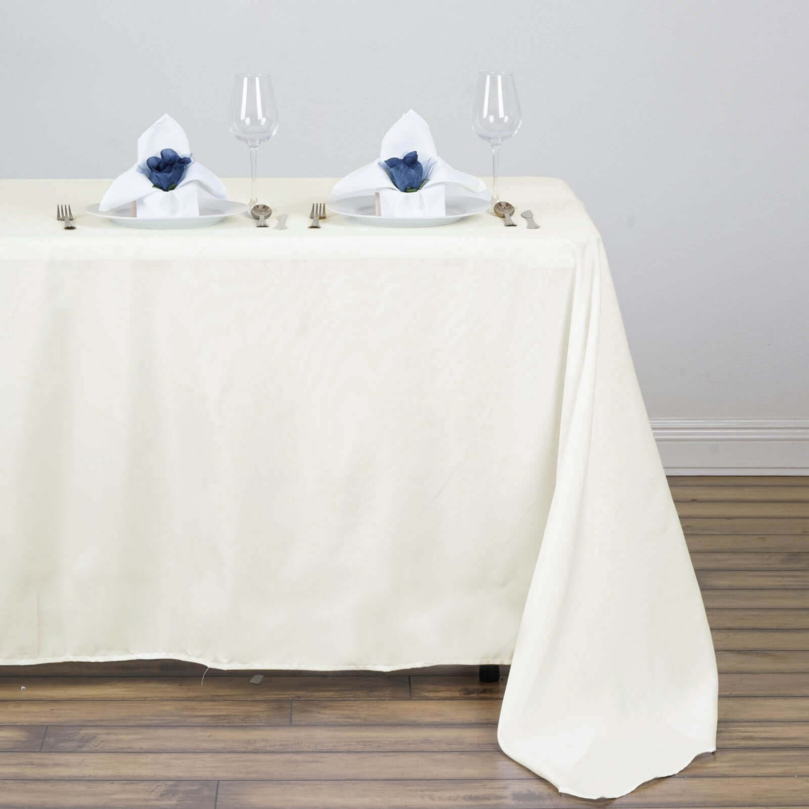 Wrinkle-Resistant & Easy-Care Ivory Polyester Rectangle Tablecloth (54x96) - Ideal for Events