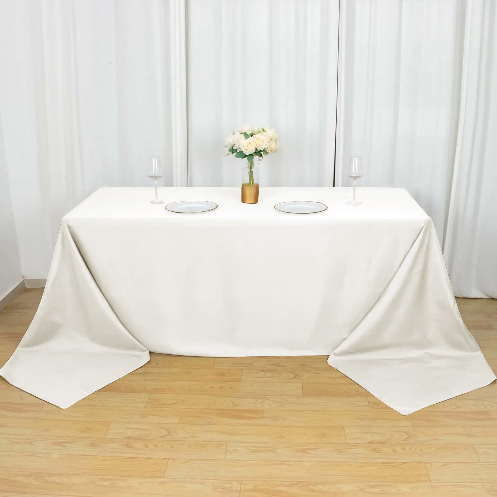 Ivory Polyester Seamless Wrinkle-Resistant 90x156 Rectangle Tablecloth - Ideal for Events