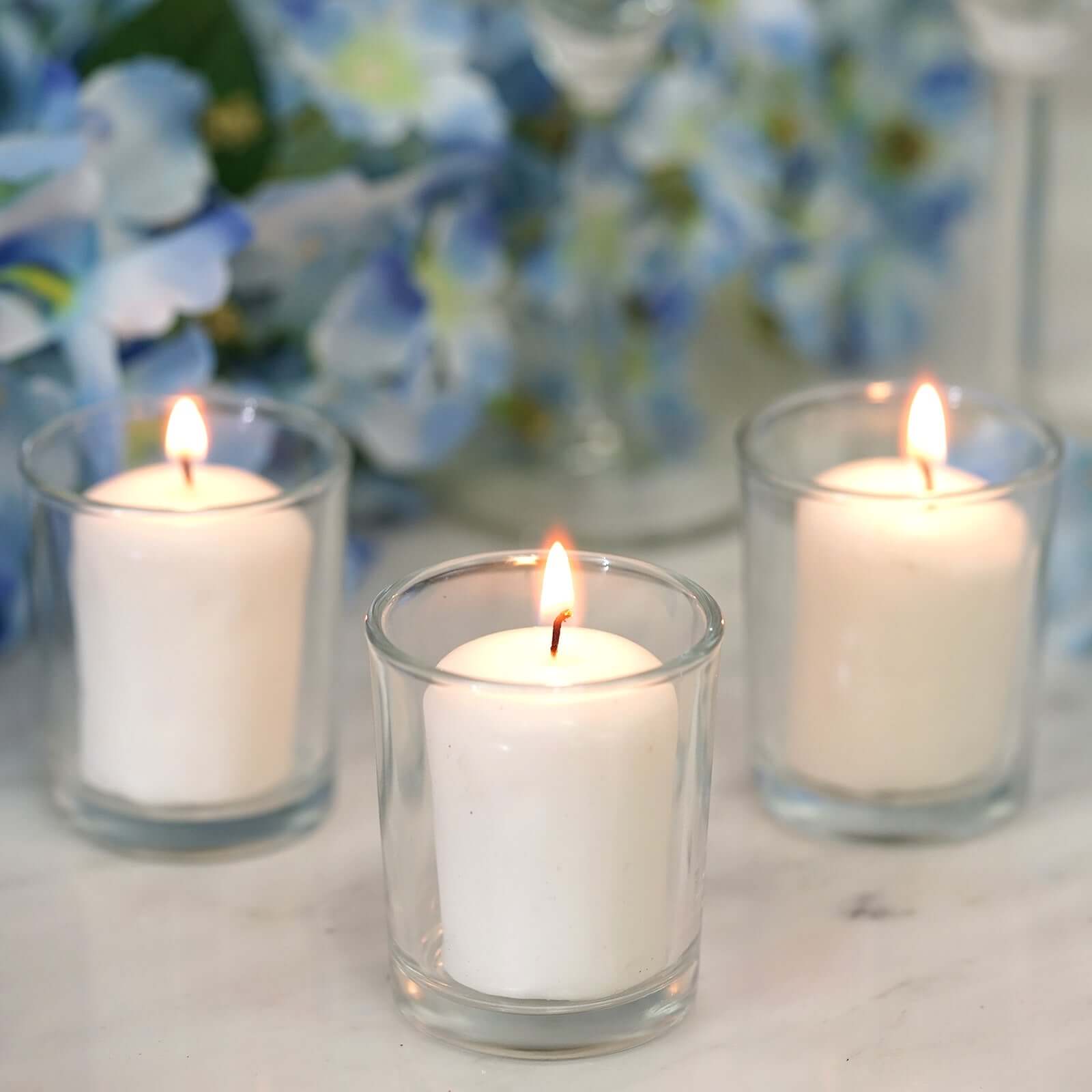 12-Piece Set of White Votive Tealight Candles with Clear Glass Holders for Decor
