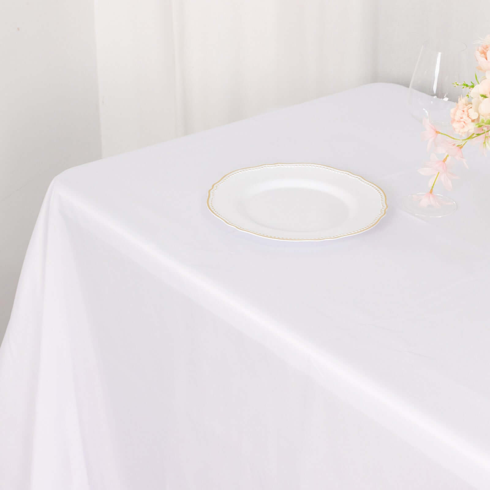 White Polyester Rectangle Tablecloth 90x132 - Ideal for Elegant Gatherings, Rounded Corners & Seamless Design