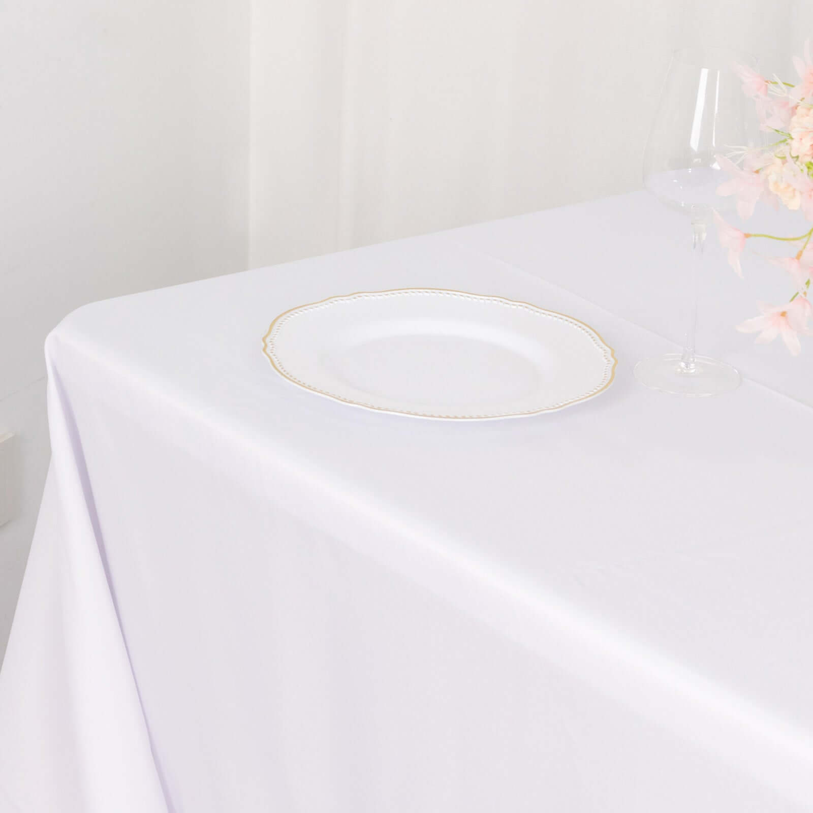 White 90x156 Polyester Rectangle Tablecloth with Rounded Corners for Elegant Events