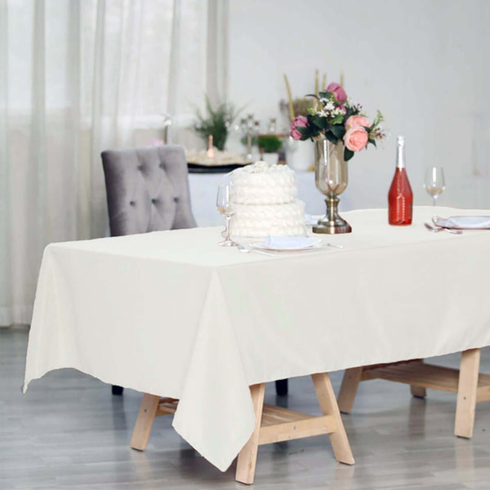 Durable and Elegant Ivory 60x102 Rectangle Polyester Tablecloth