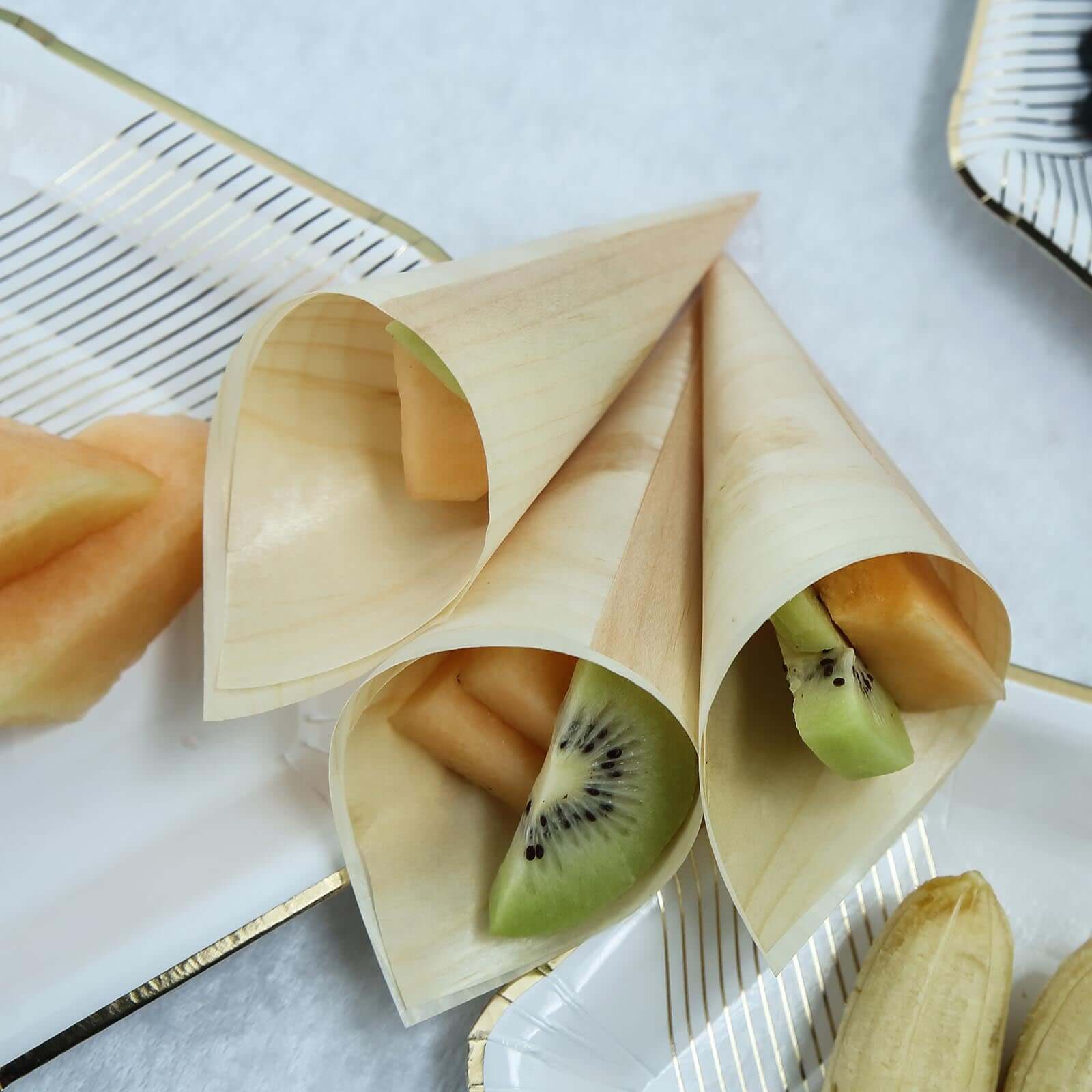 Get 50-Pack Eco-Friendly Natural Pine Wood Disposable Food Tasting and Serving Cones, 6 Inches