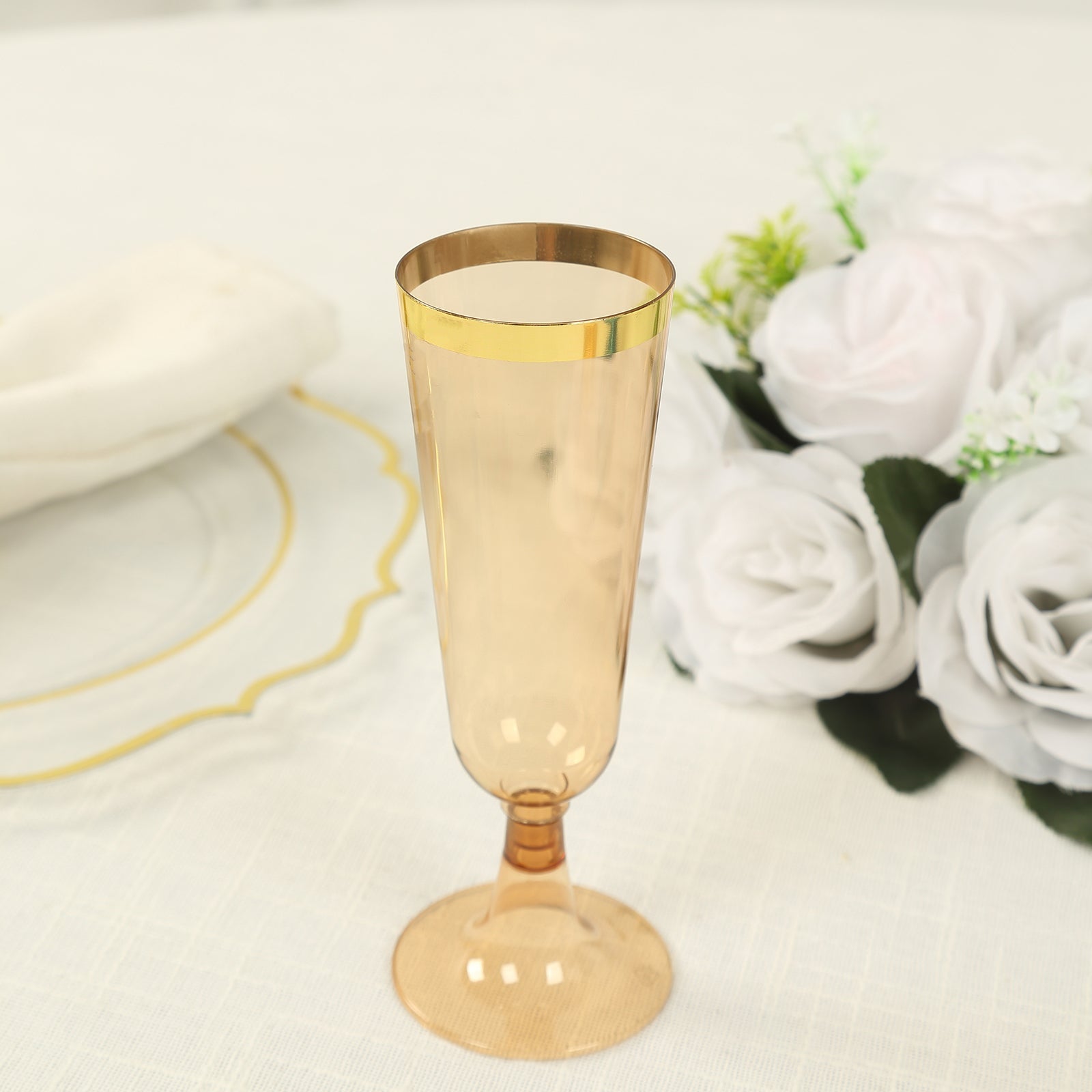 Stylish Disposable 5oz Plastic Champagne Flutes in Transparent Amber Gold with Gold Rim - 12-Pack for Parties