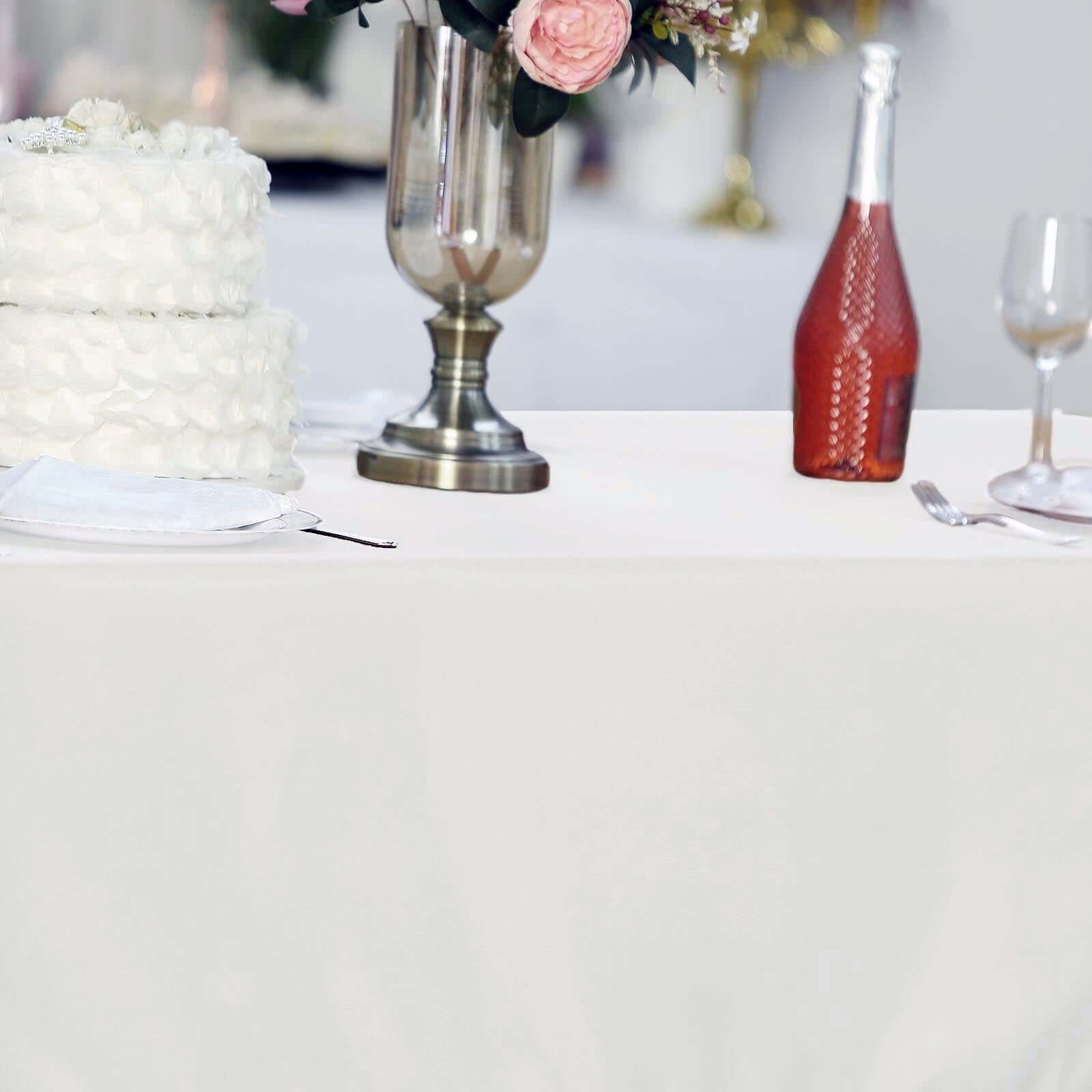 Durable and Elegant Ivory 60x102 Rectangle Polyester Tablecloth