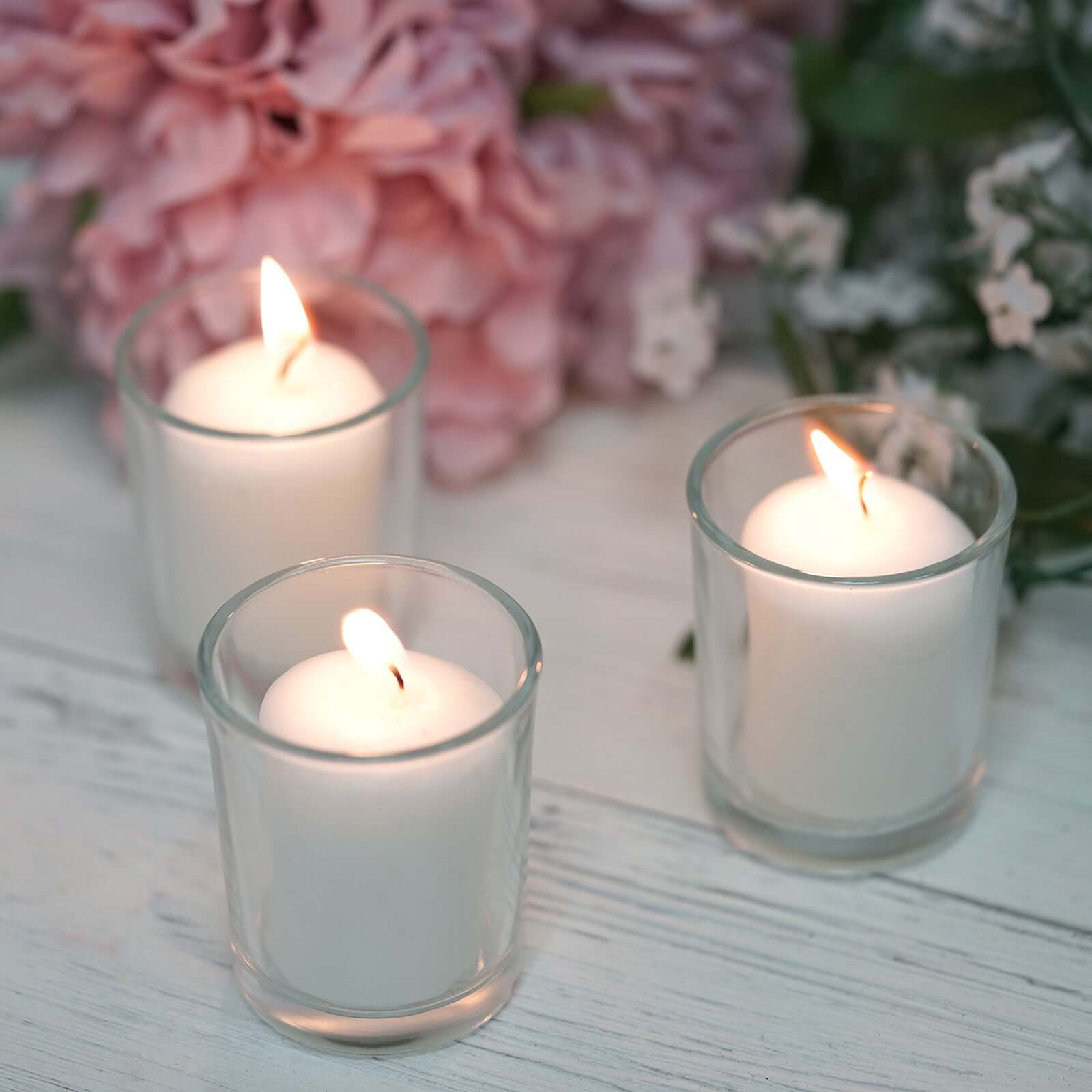 12-Piece Set of White Votive Tealight Candles with Clear Glass Holders for Decor