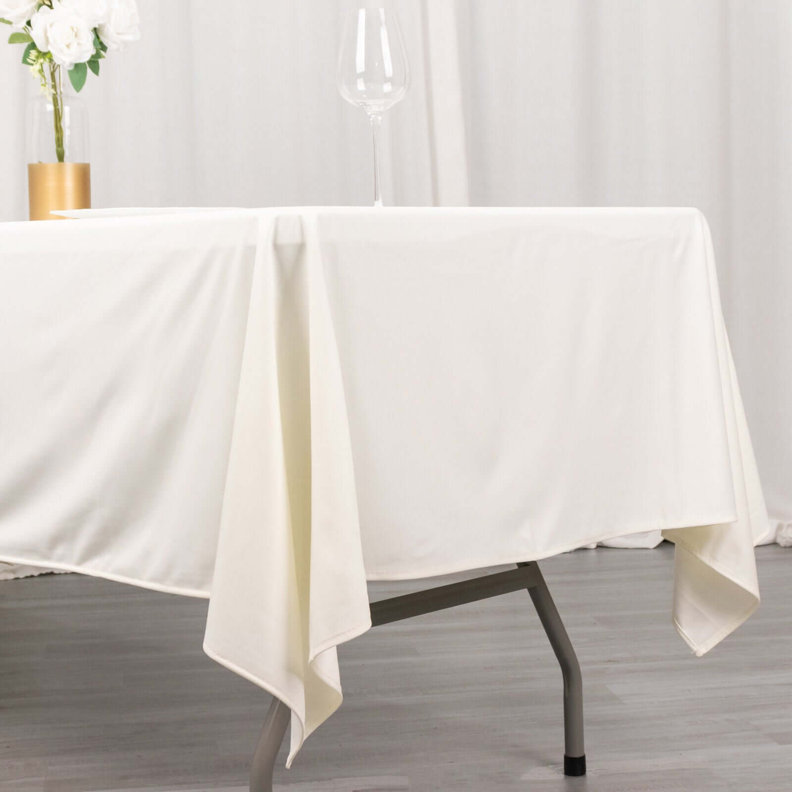 Ivory Premium Scuba 60x102 Wrinkle-Free & Stain-Resistant Rectangular Tablecloth - Ideal for Events