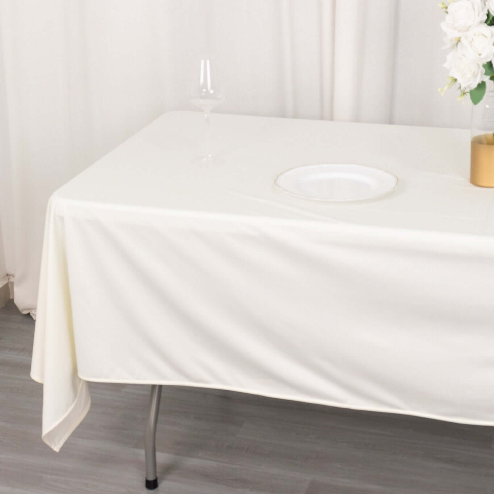 Ivory Premium Scuba 60x102 Wrinkle-Free & Stain-Resistant Rectangular Tablecloth - Ideal for Events