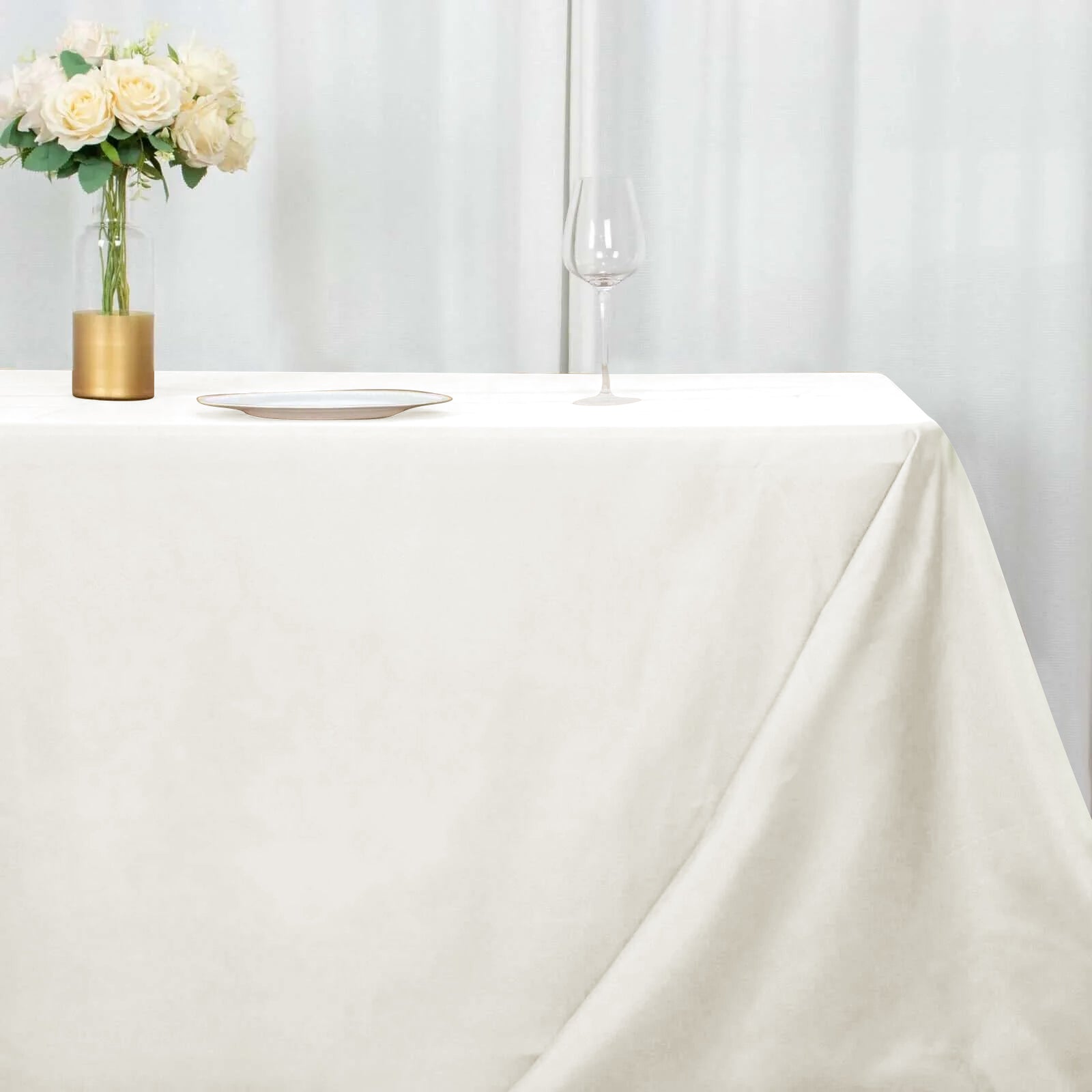 Ivory Polyester Seamless Wrinkle-Resistant 90x156 Rectangle Tablecloth - Ideal for Events